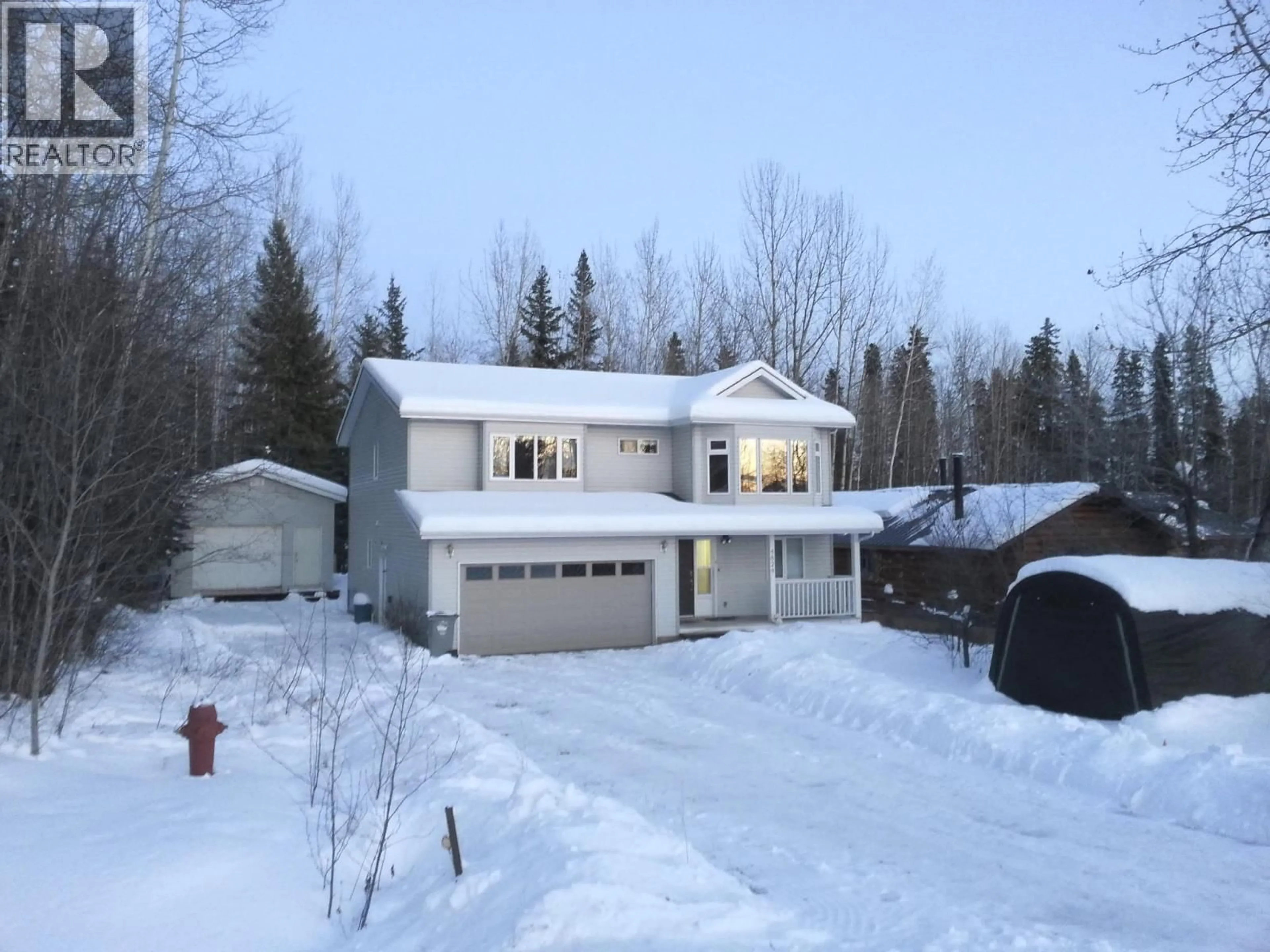 A pic from outside/outdoor area/front of a property/back of a property/a pic from drone, street for 4824 GAIRDNER CRESCENT, Fort Nelson British Columbia V0C1R0
