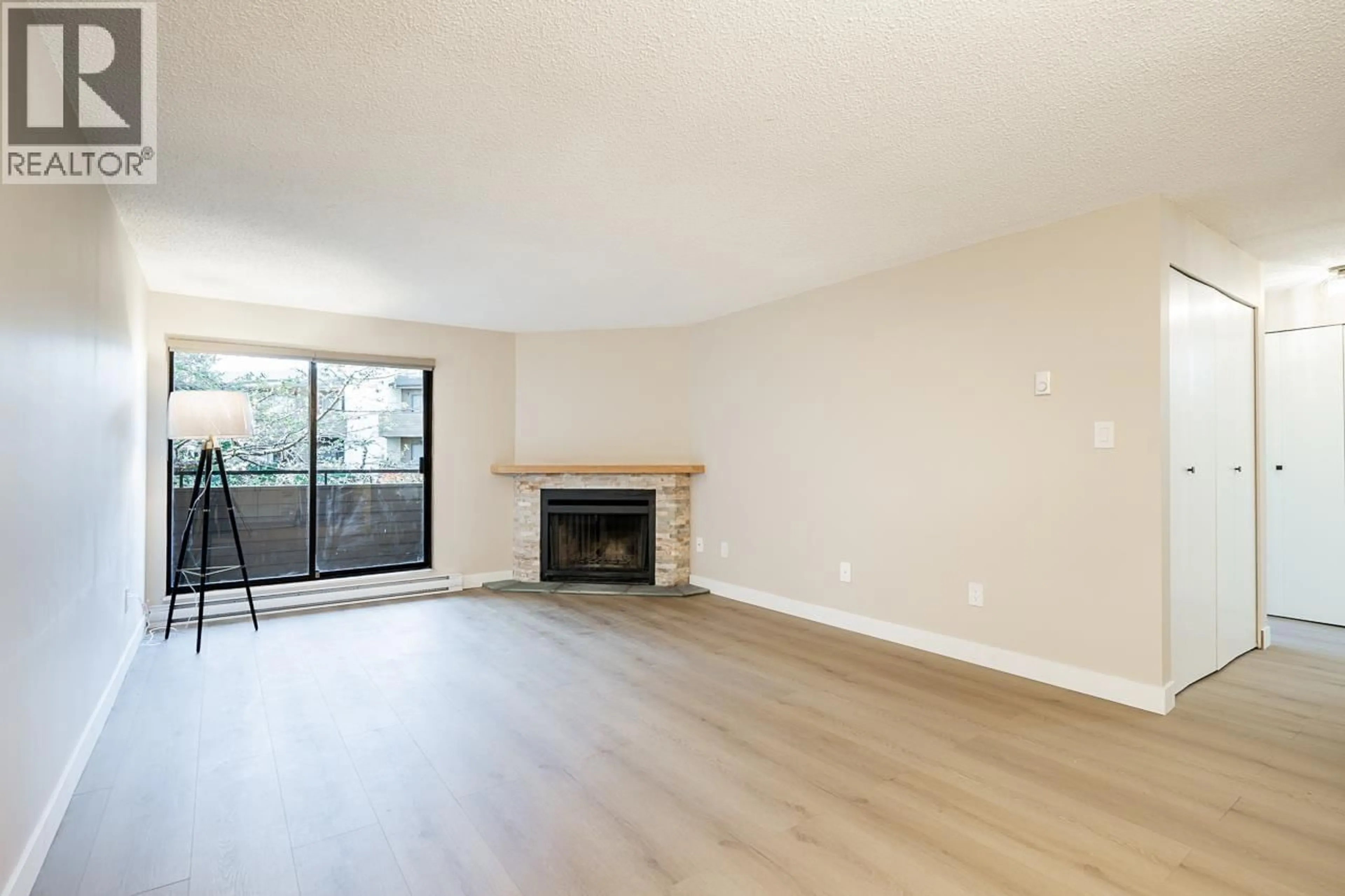 Living room with furniture, wood/laminate floor for 254 - 7293 MOFFATT ROAD, Richmond British Columbia V6Y3E4