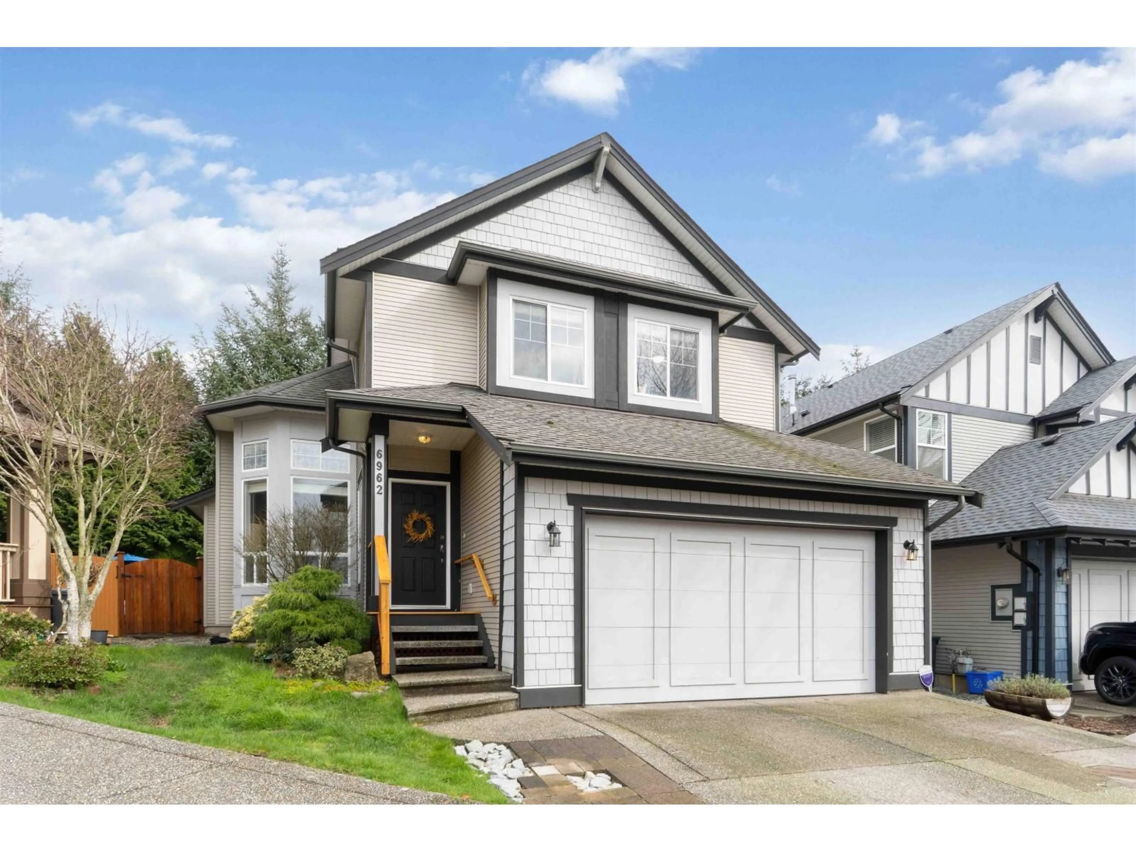 Home with vinyl exterior material, street for 6962 198B STREET, Langley British Columbia V2Y3B4