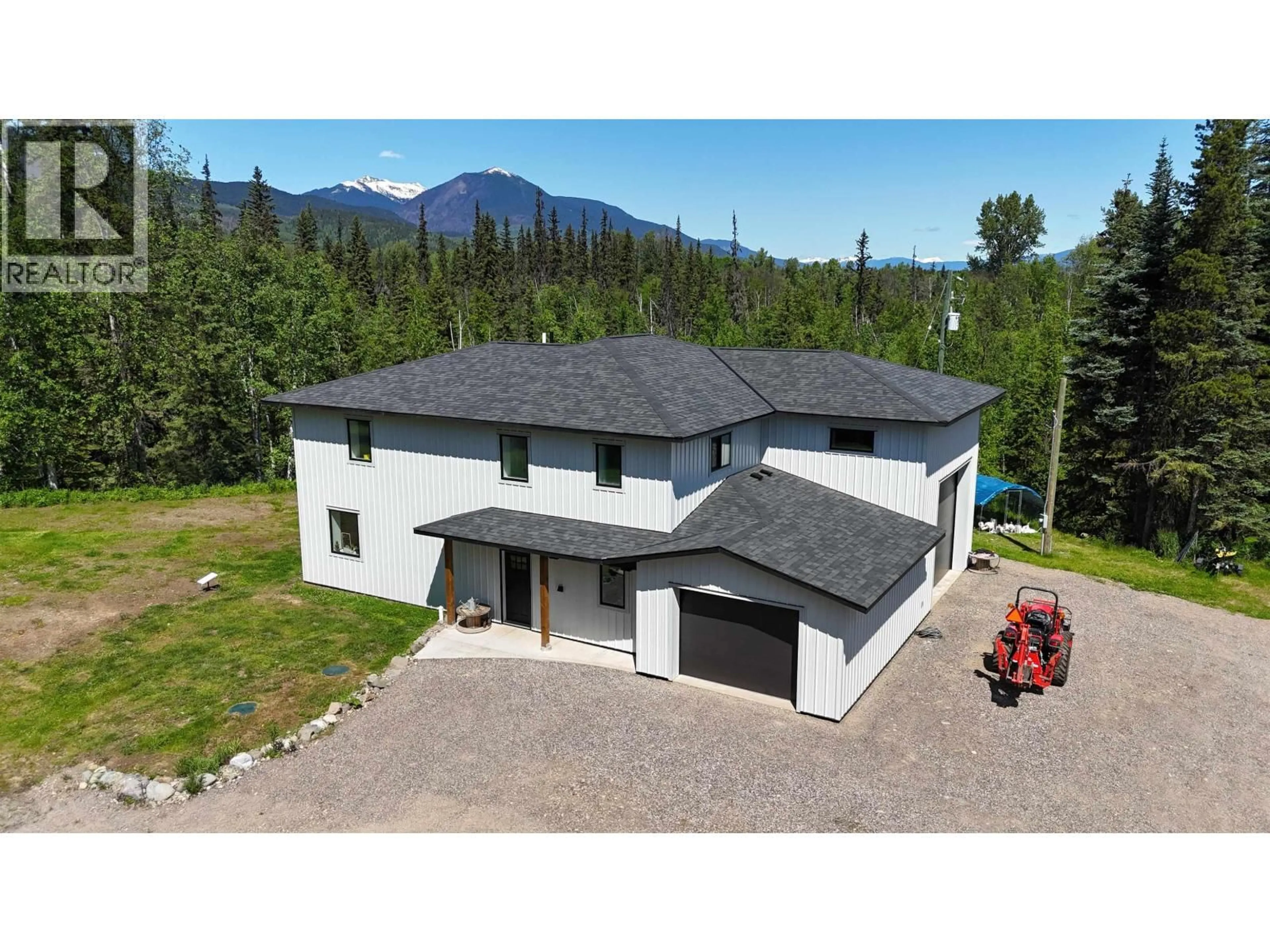 A pic from outside/outdoor area/front of a property/back of a property/a pic from drone, mountain view for 24151 RIVER ROAD, Smithers British Columbia V0J2N1