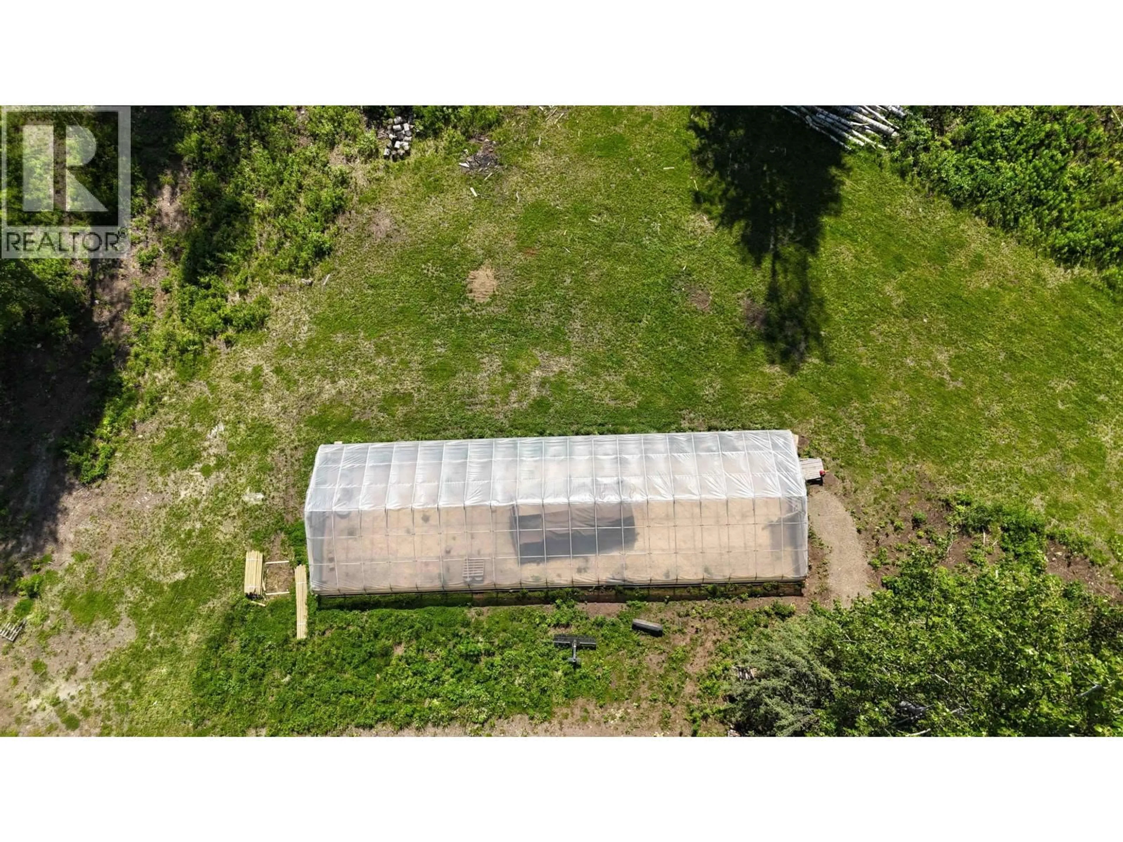 A pic from outside/outdoor area/front of a property/back of a property/a pic from drone, building for 24151 RIVER ROAD, Smithers British Columbia V0J2N1