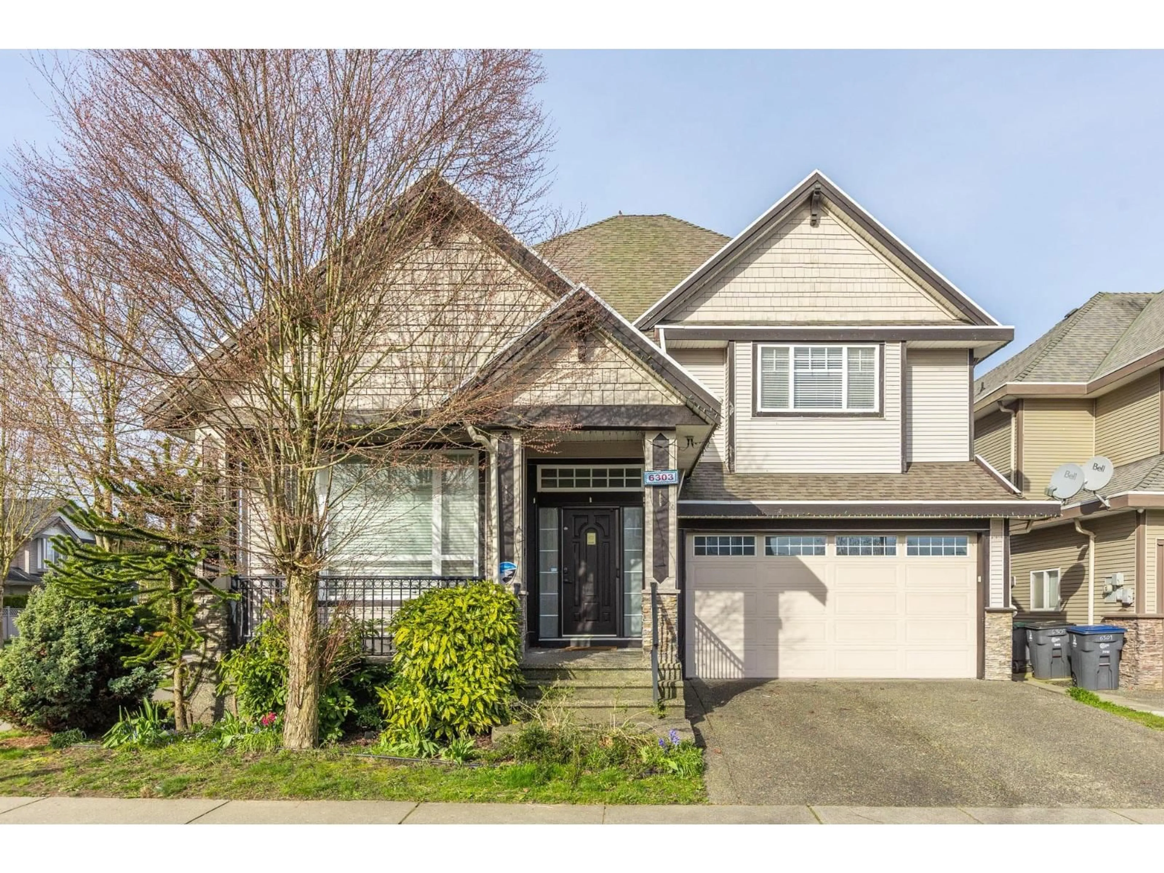 Home with vinyl exterior material, street for 6303 167B STREET, Surrey British Columbia V3S1X3
