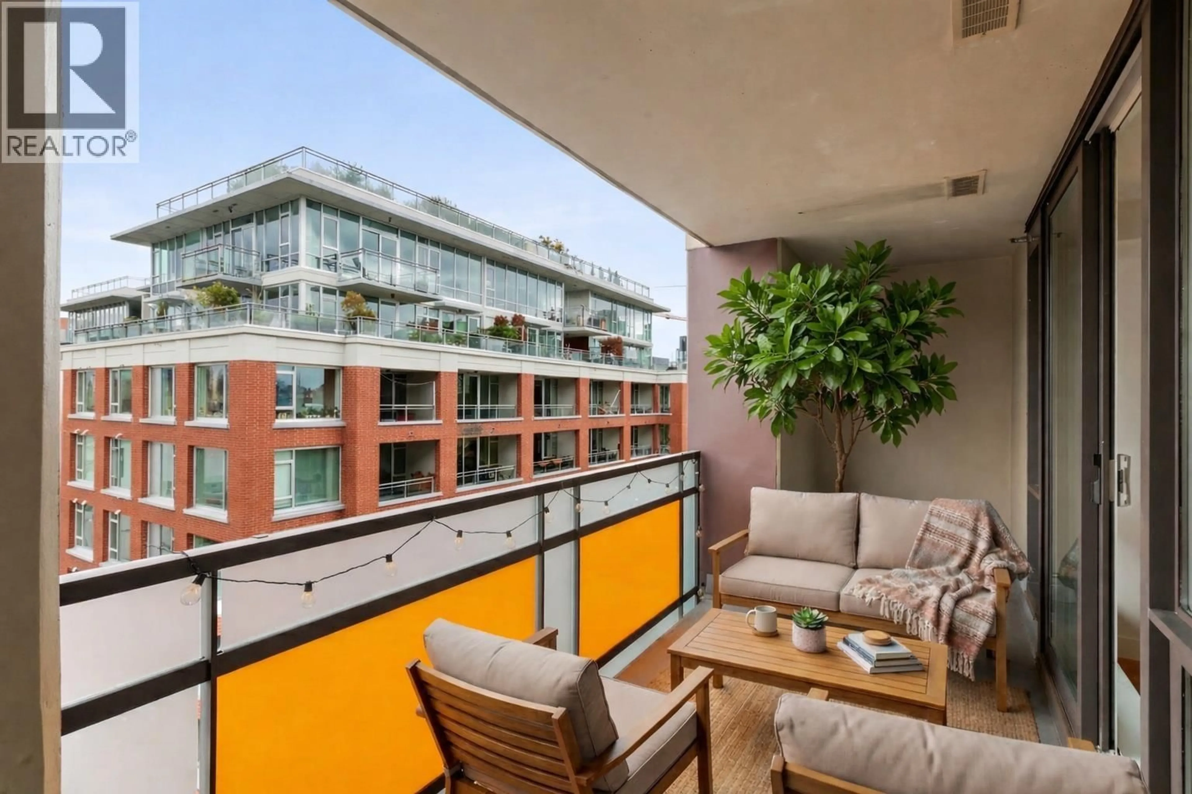 Balcony in the apartment, city buildings view from balcony for 710 - 718 MAIN STREET, Vancouver British Columbia V6A0B1