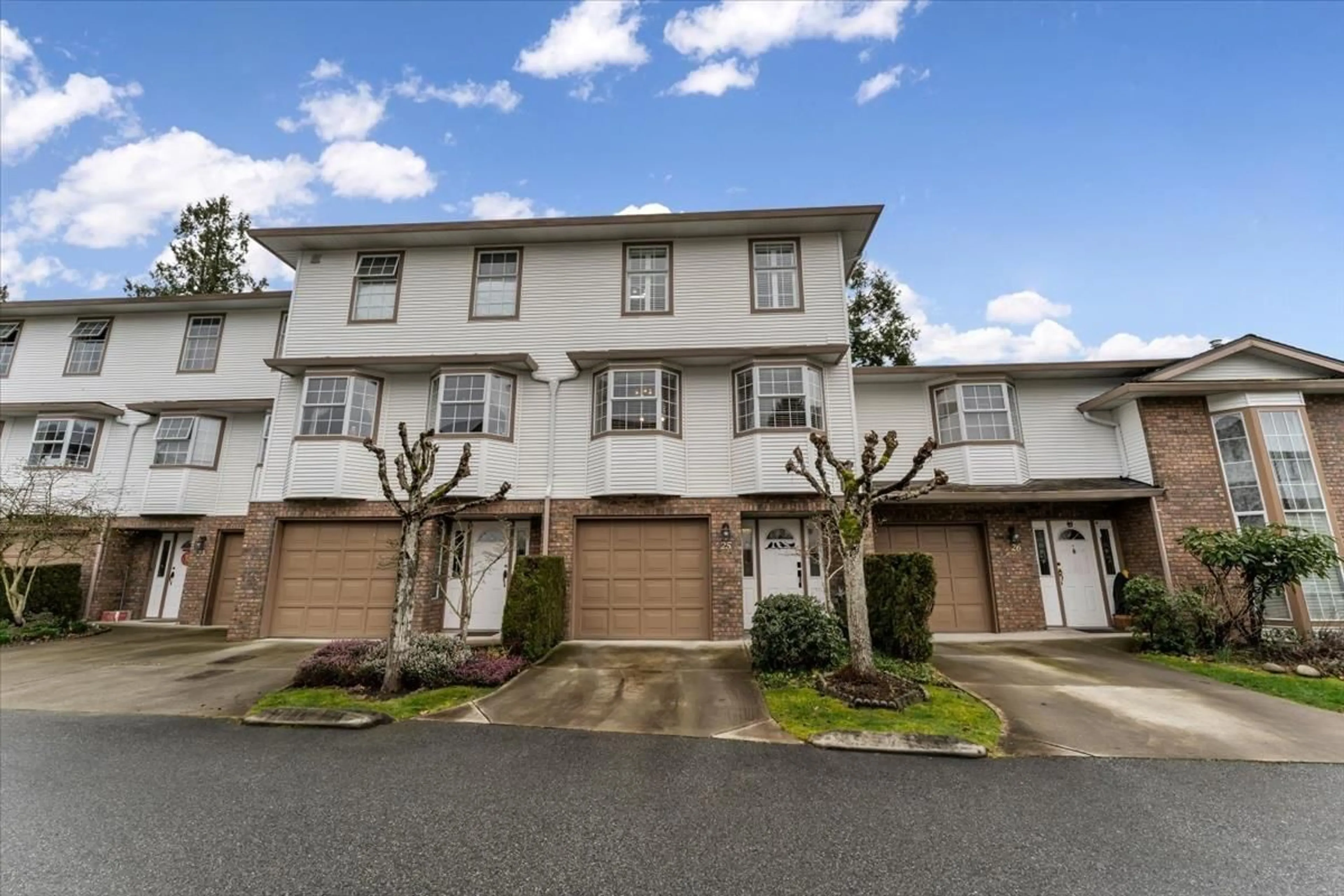 A pic from outside/outdoor area/front of a property/back of a property/a pic from drone, street for 25 - 10045 154 STREET, Surrey British Columbia V3R4J5