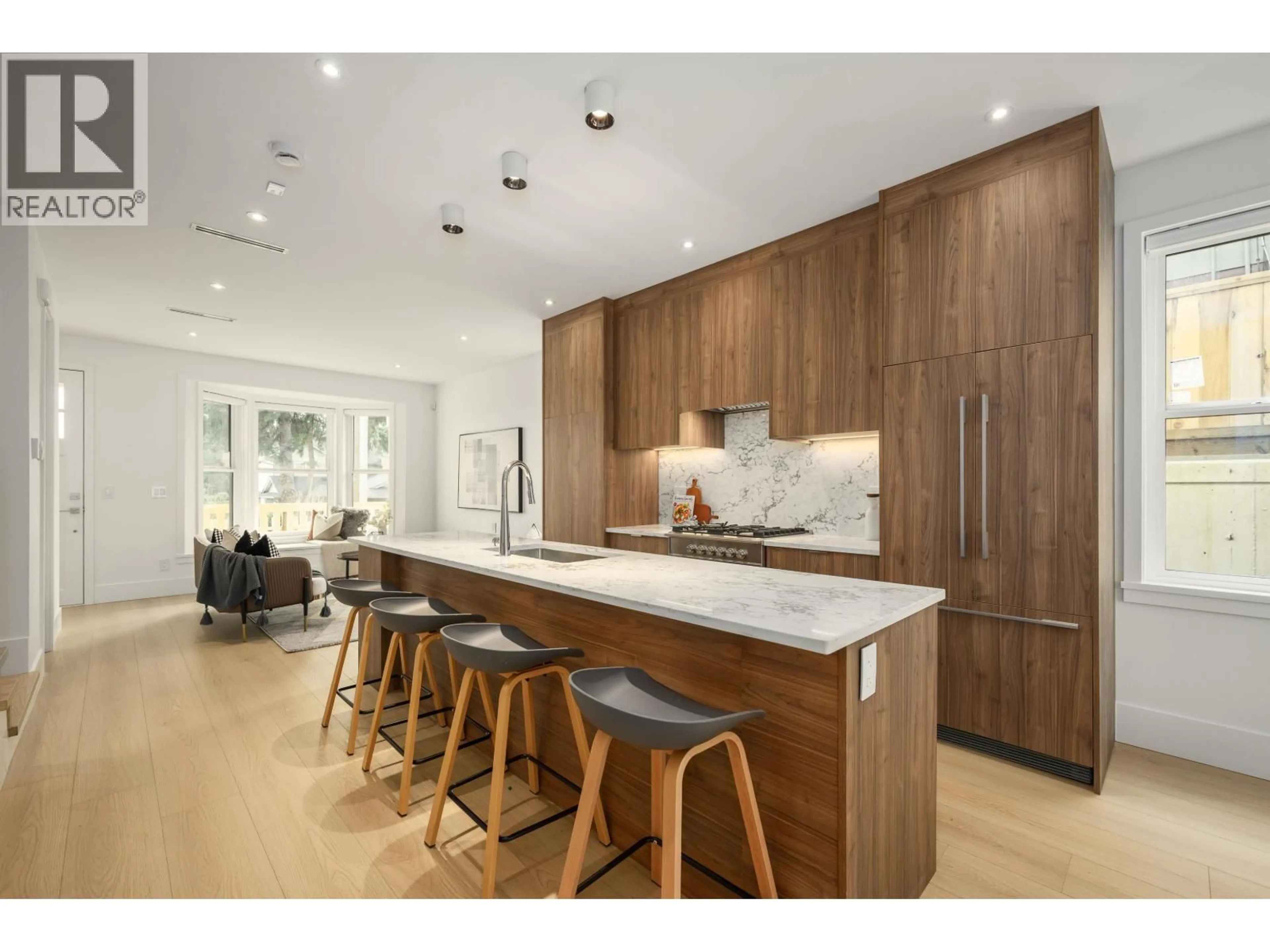 Open concept kitchen, wood/laminate floor for 101 - 1125 CARTIER AVENUE, Coquitlam British Columbia V3K2C1