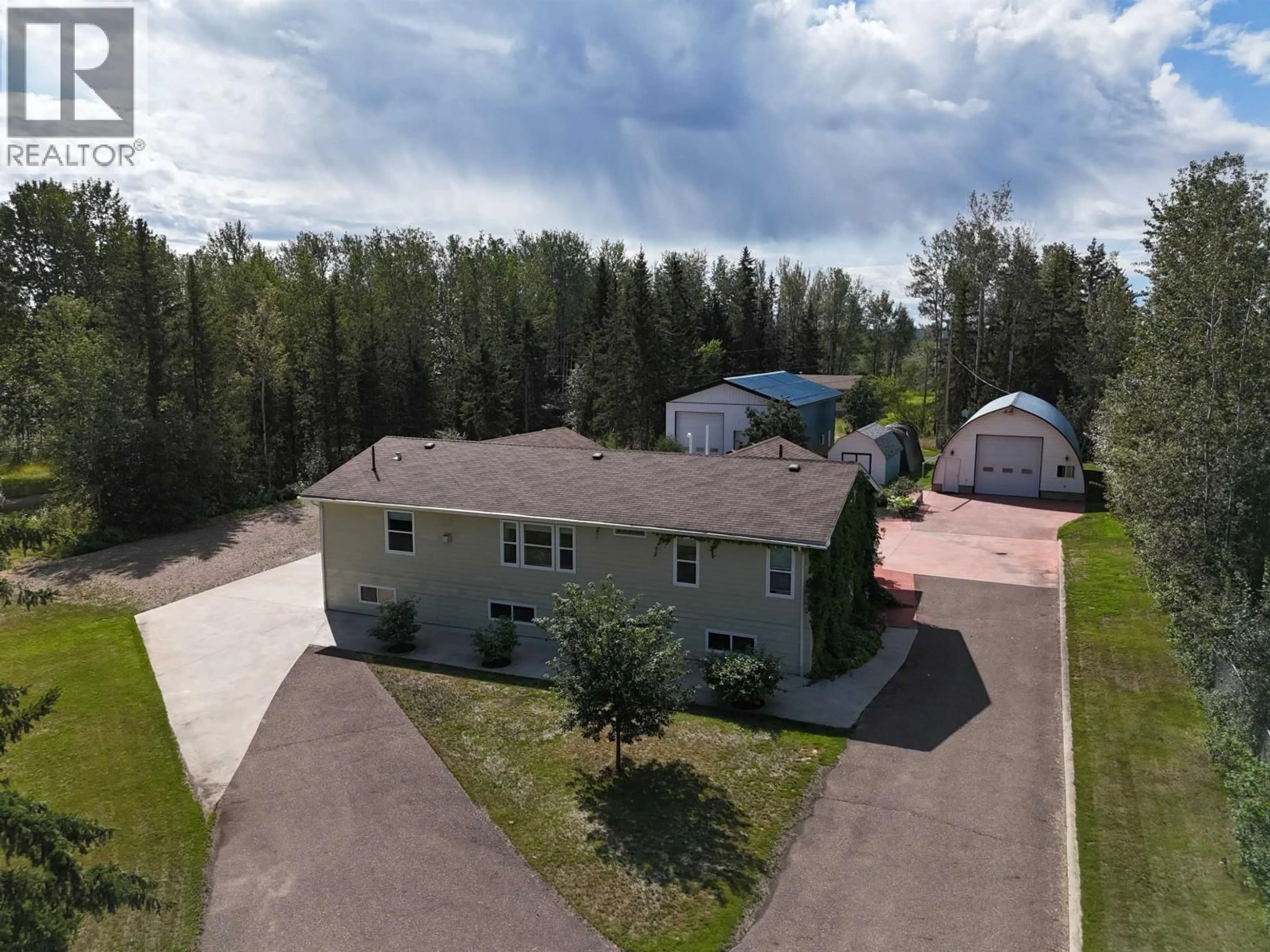A pic from outside/outdoor area/front of a property/back of a property/a pic from drone, unknown for 4 RESERVE ROAD, Fort Nelson British Columbia V0C1R0