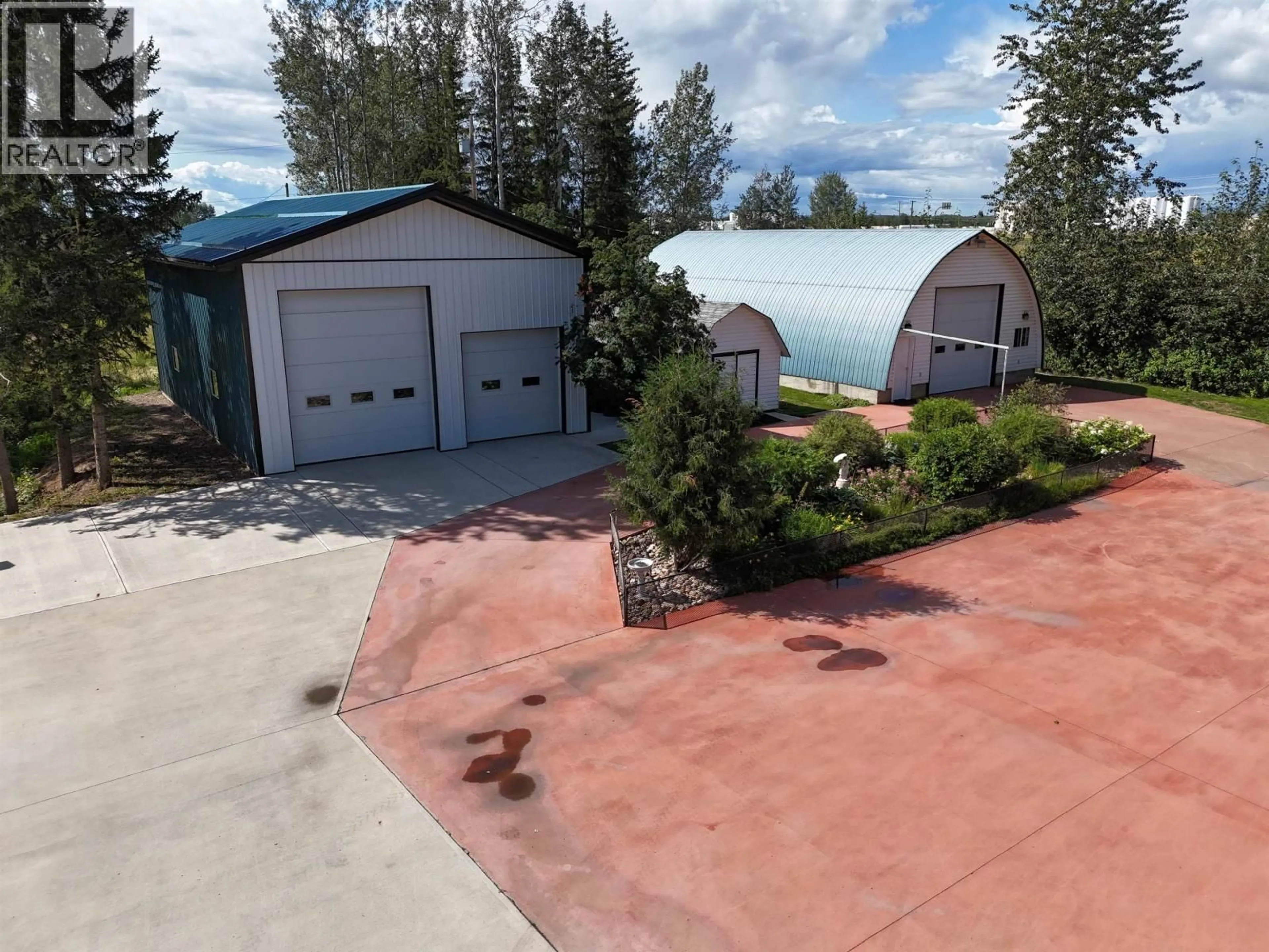 A pic from outside/outdoor area/front of a property/back of a property/a pic from drone, water/lake/river/ocean view for 4 RESERVE ROAD, Fort Nelson British Columbia V0C1R0
