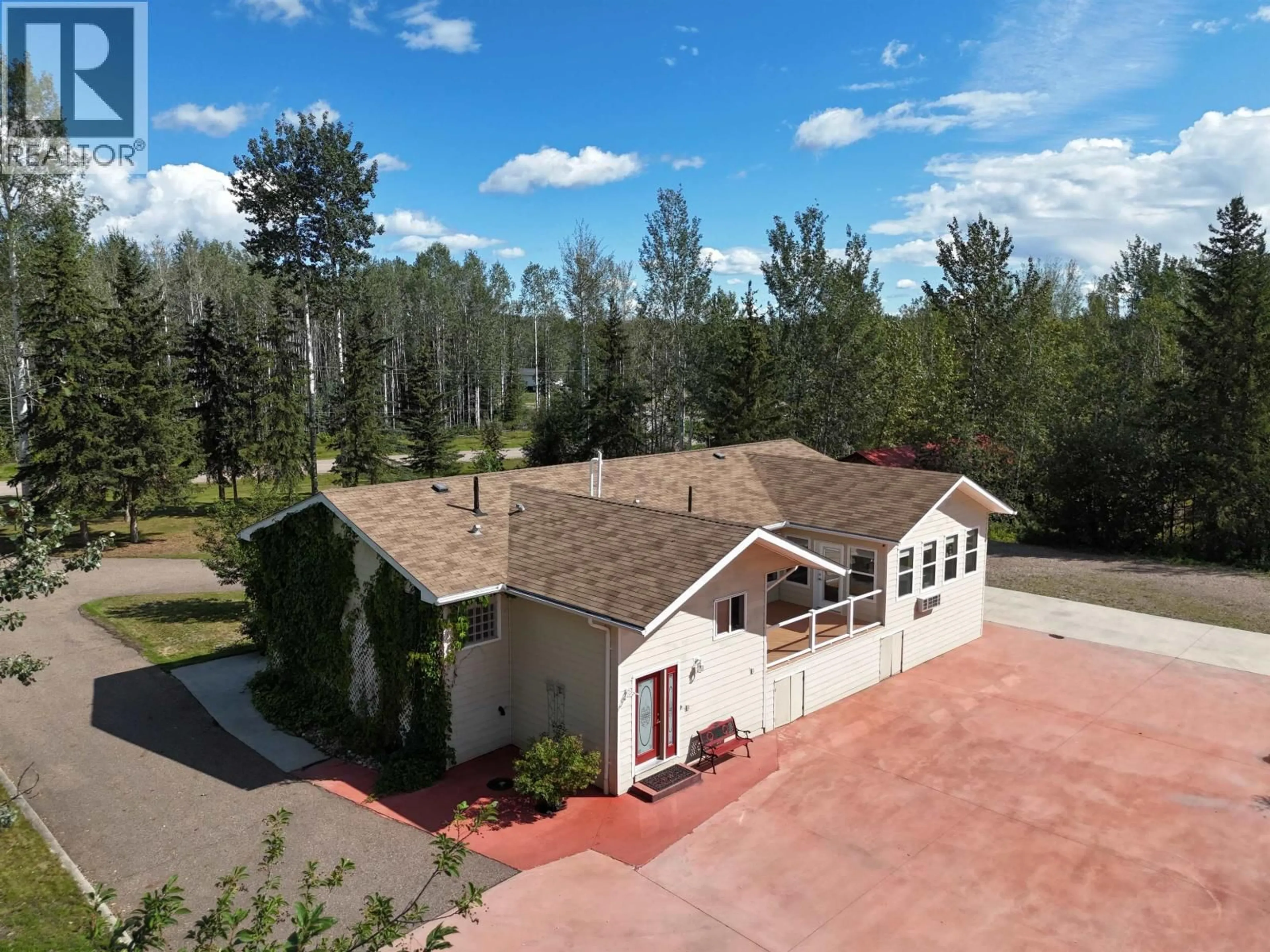A pic from outside/outdoor area/front of a property/back of a property/a pic from drone, unknown for 4 RESERVE ROAD, Fort Nelson British Columbia V0C1R0
