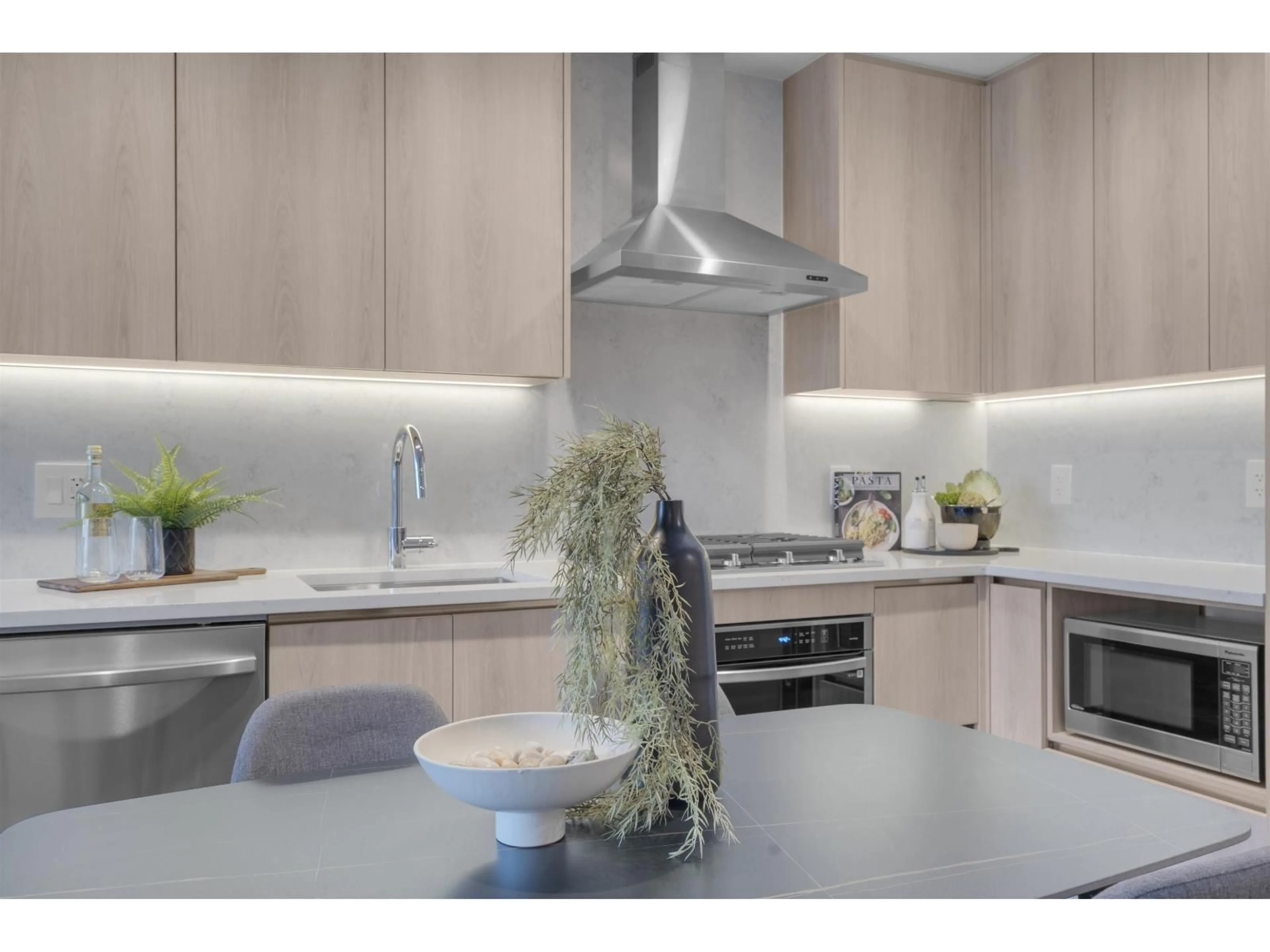 Contemporary kitchen, wood/laminate floor for 2405 - 10750 135A STREET, Surrey British Columbia V3T0V4