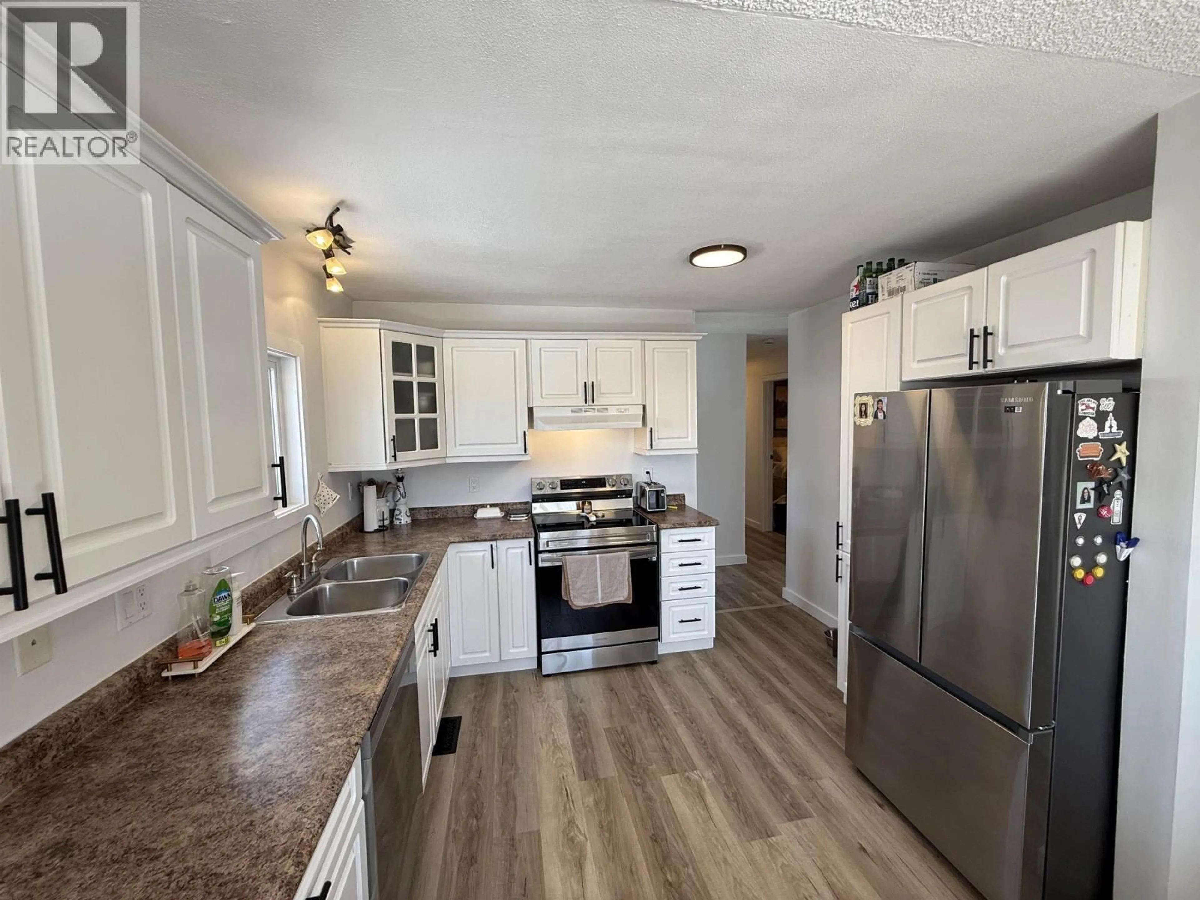 Open concept kitchen, unknown for 10416 106 STREET, Fort St. John British Columbia V1J4K4