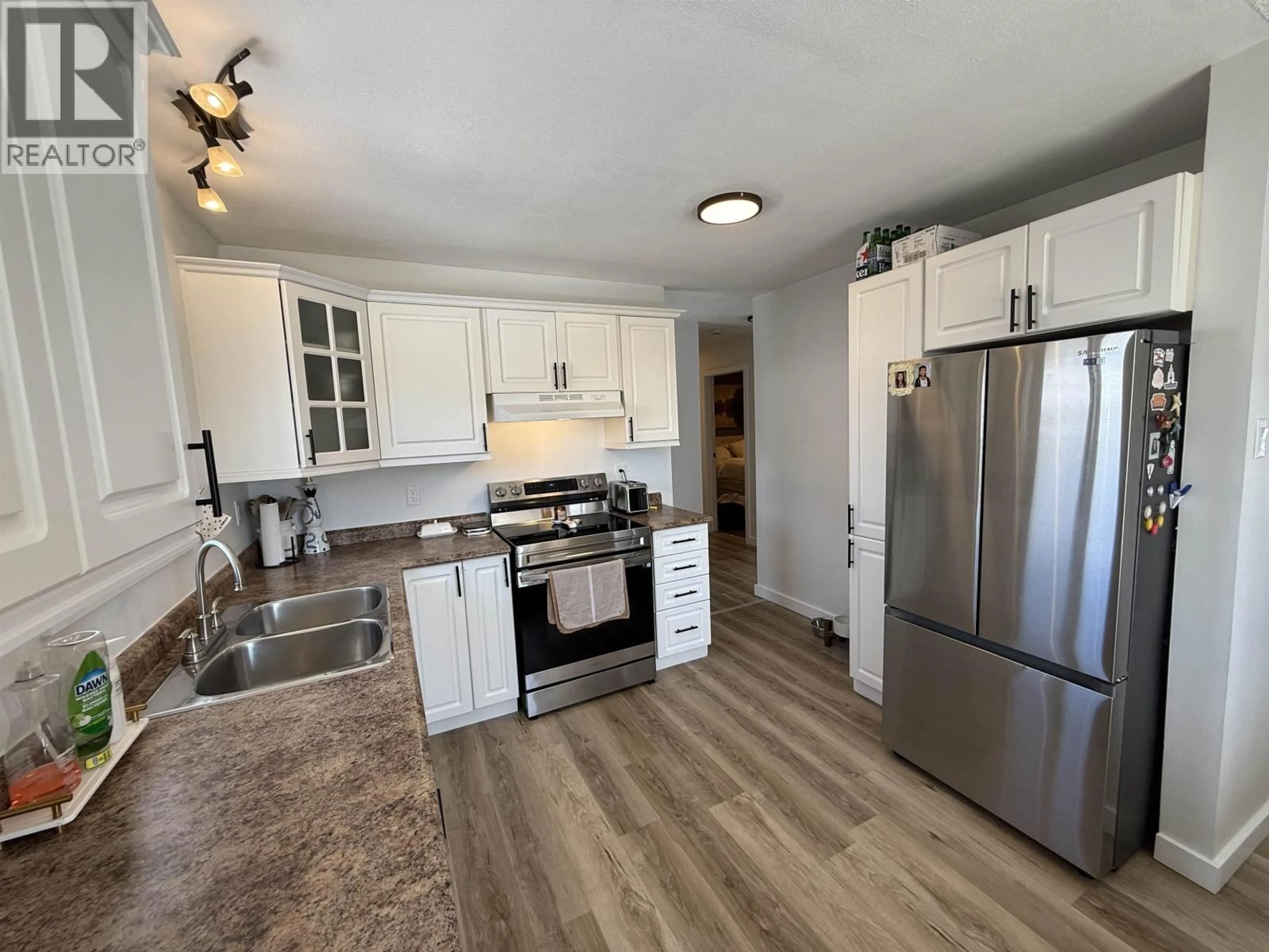 Open concept kitchen, unknown for 10416 106 STREET, Fort St. John British Columbia V1J4K4