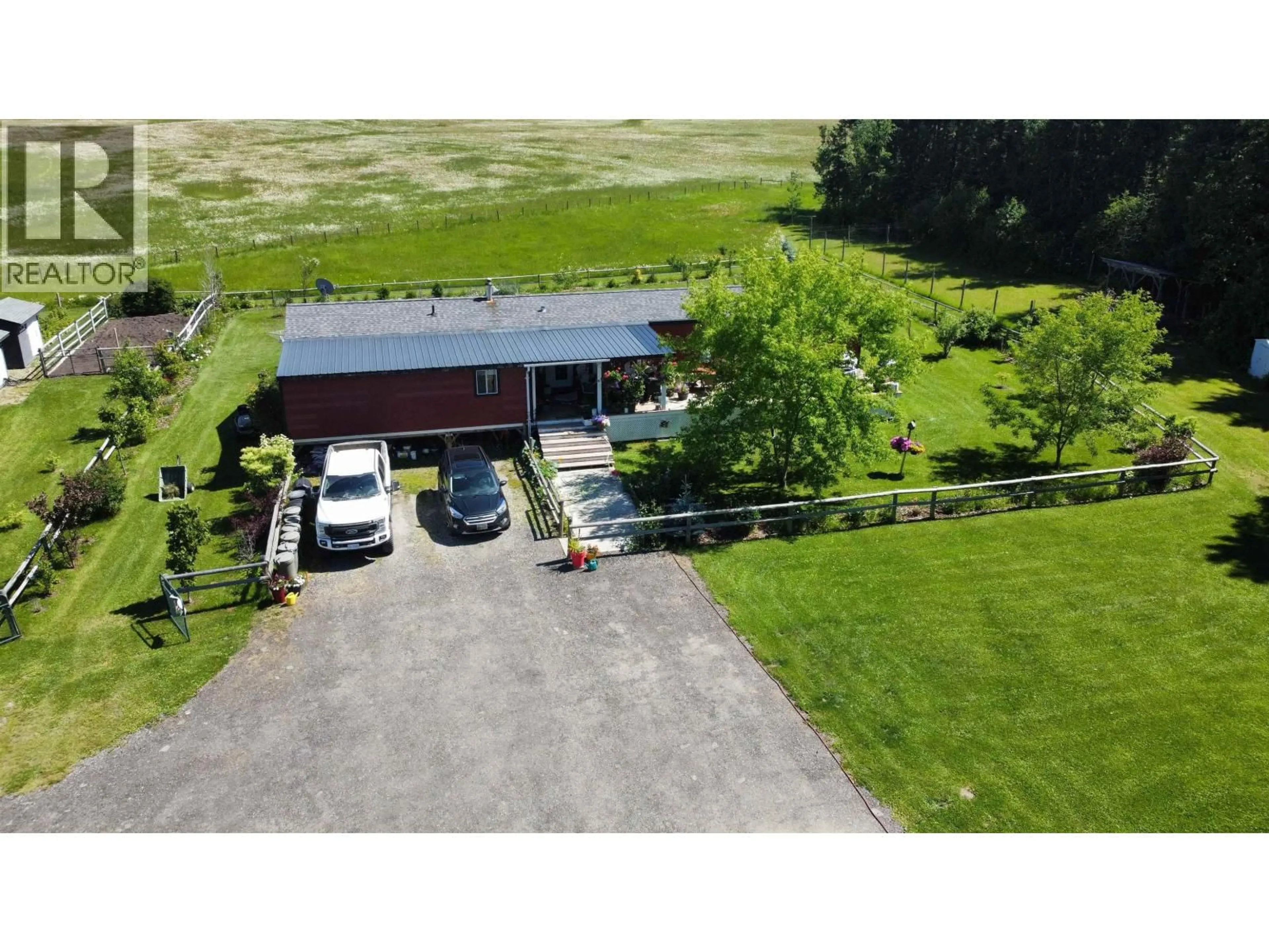 A pic from outside/outdoor area/front of a property/back of a property/a pic from drone, unknown for 4950 QUESNEL-HIXON ROAD, Quesnel British Columbia V2J6Y7