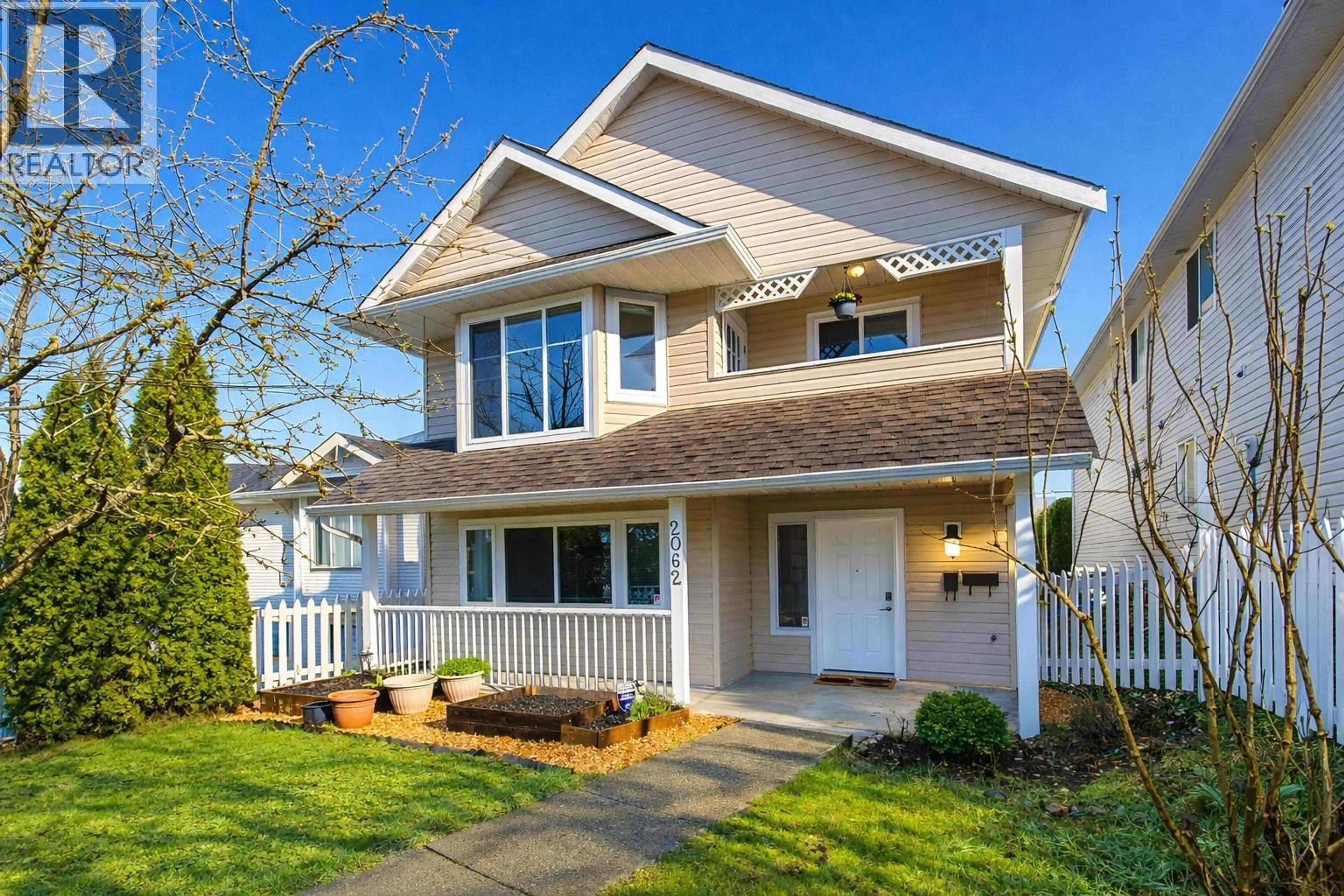 Home with vinyl exterior material, street for 2062 MARY HILL ROAD, Port Coquitlam British Columbia V3C2Z8