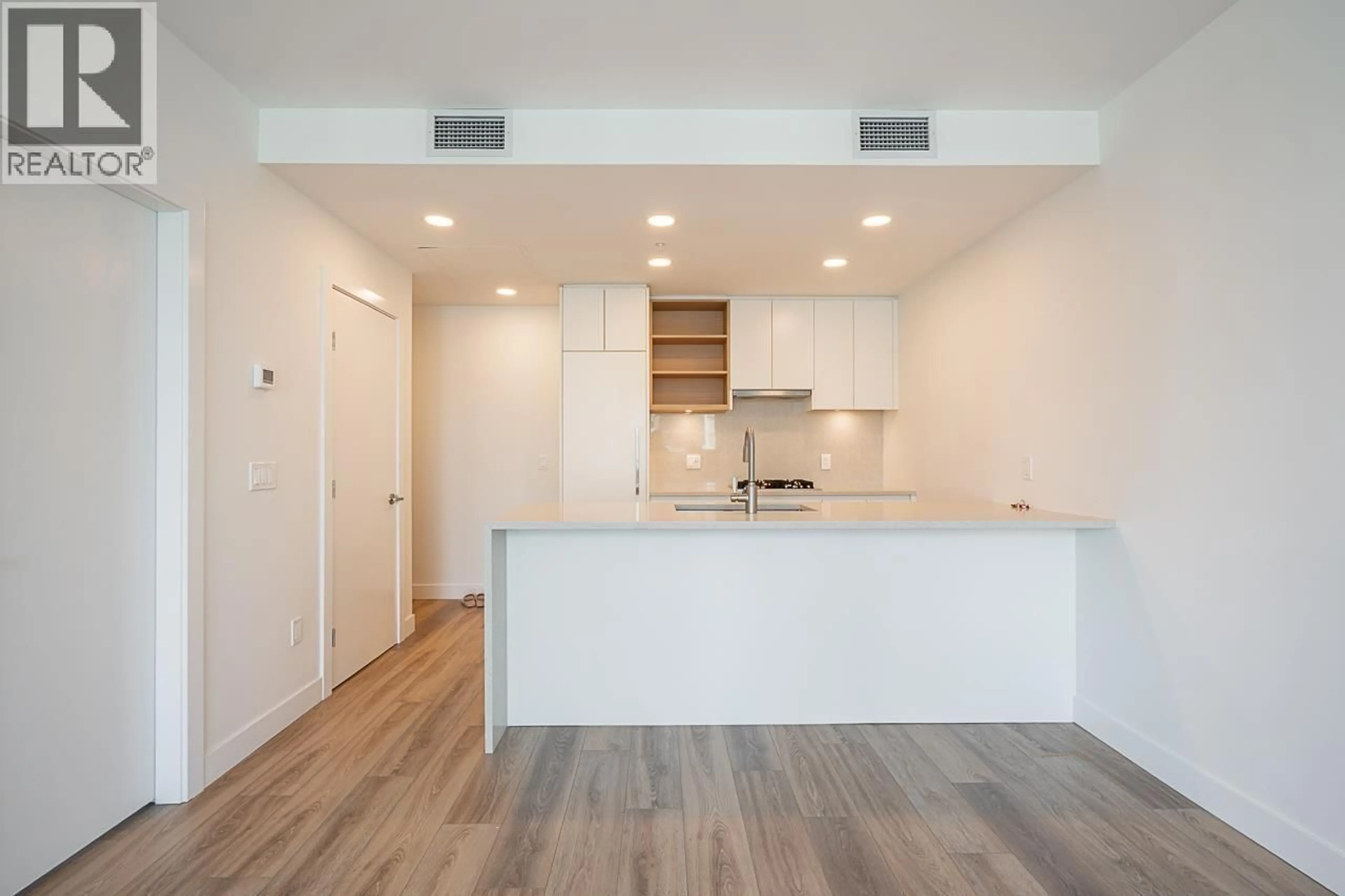 Open concept kitchen, wood/laminate floor for 2101 - 4433 ALASKA STREET, Burnaby British Columbia V5C5T3