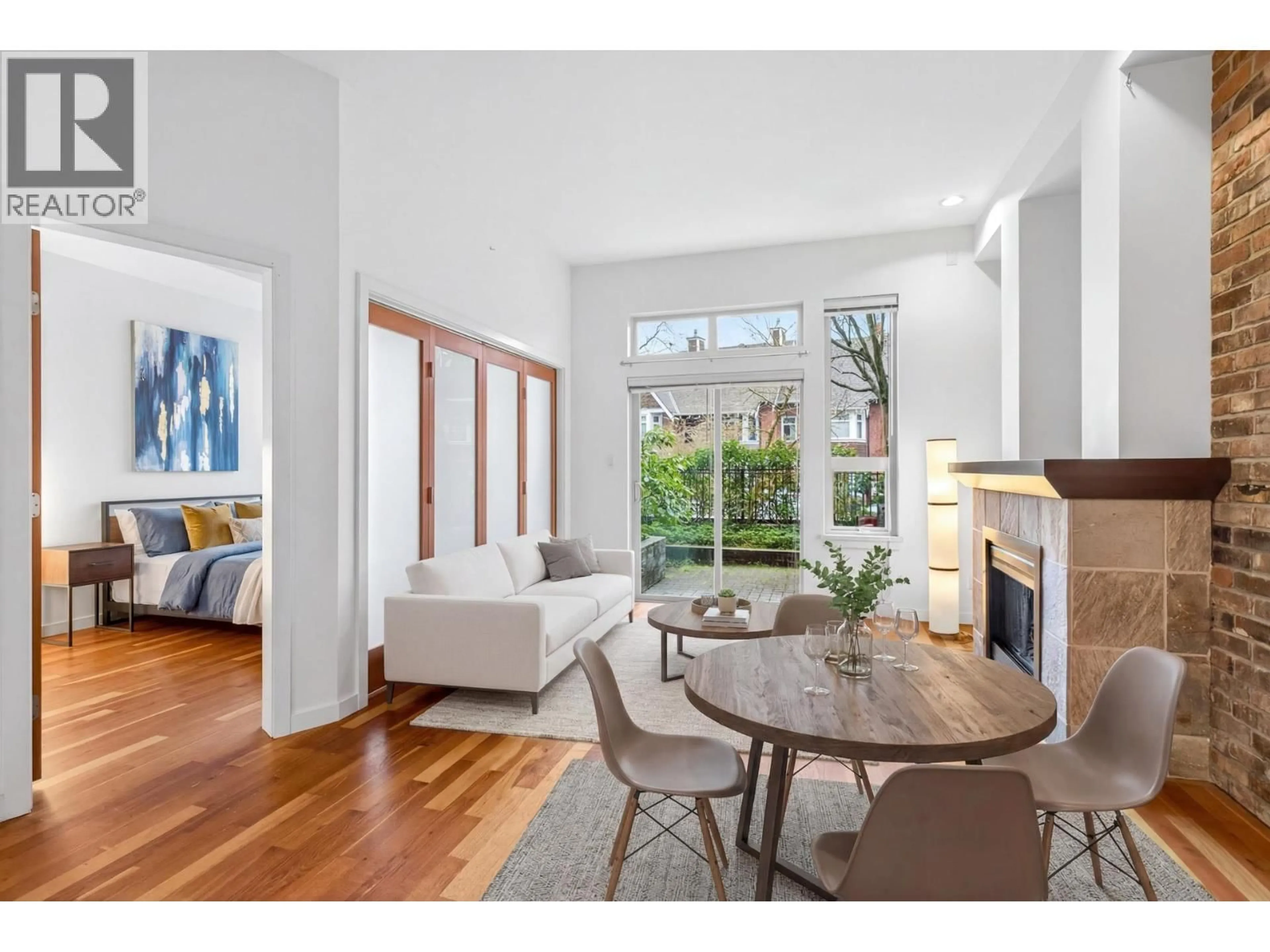 Living room with furniture, wood/laminate floor for 111 - 250 SALTER STREET, New Westminster British Columbia V3M0B7