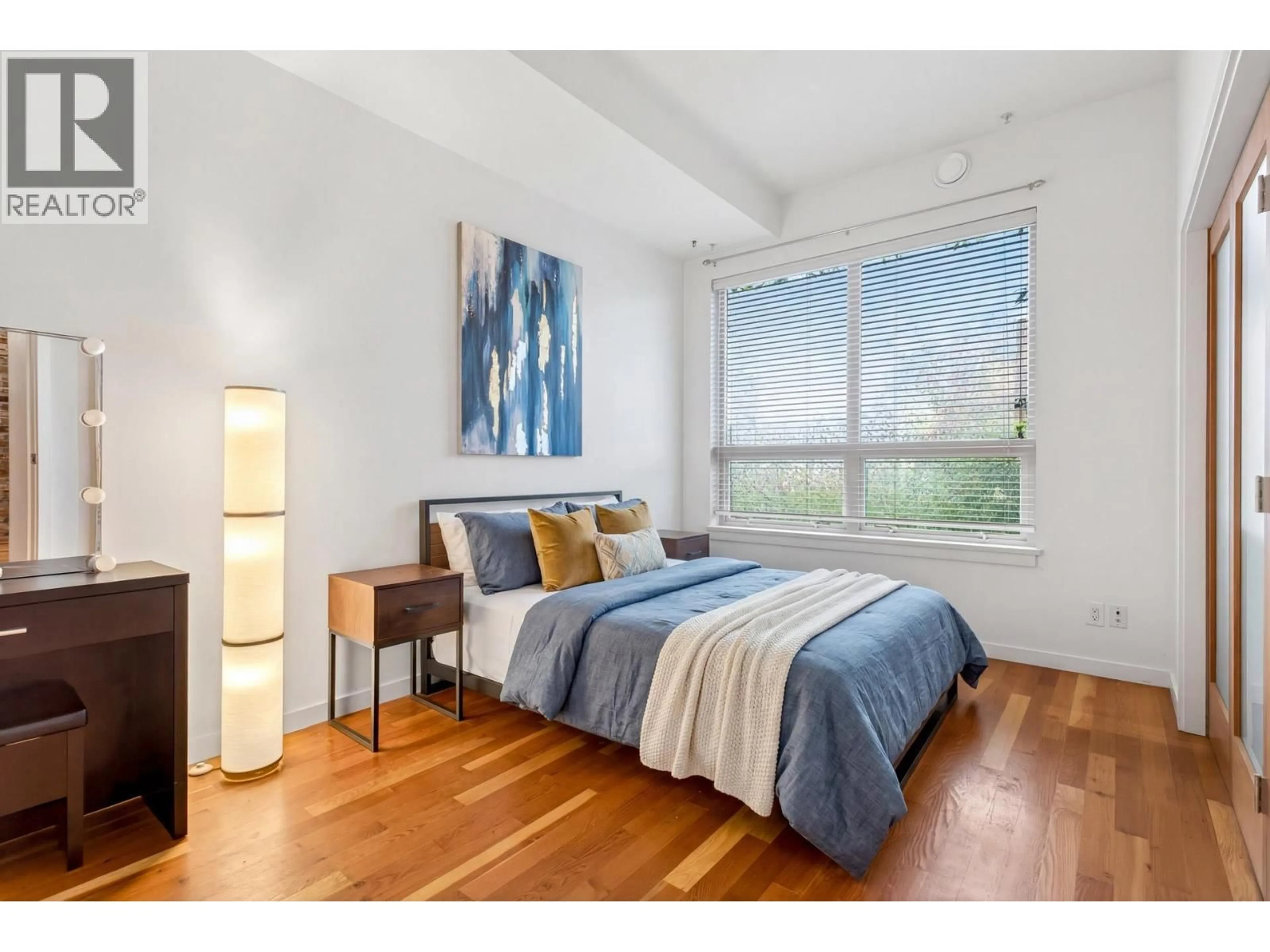 Bedroom with bed, wood/laminate floor for 111 - 250 SALTER STREET, New Westminster British Columbia V3M0B7