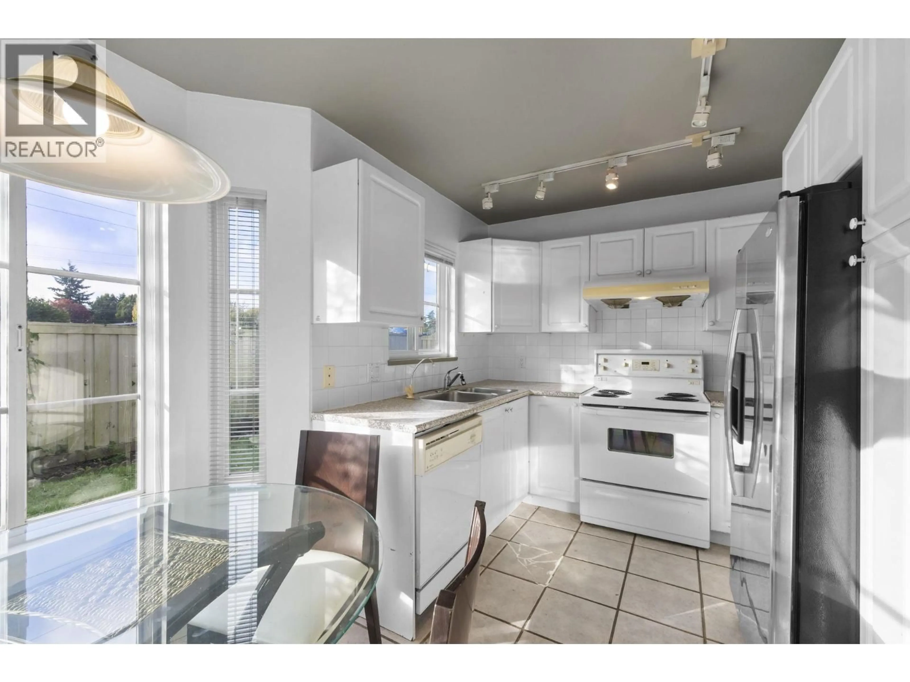 Open concept kitchen, ceramic/tile floor for 11 - 3088 AIREY DRIVE, Richmond British Columbia V6X4A3