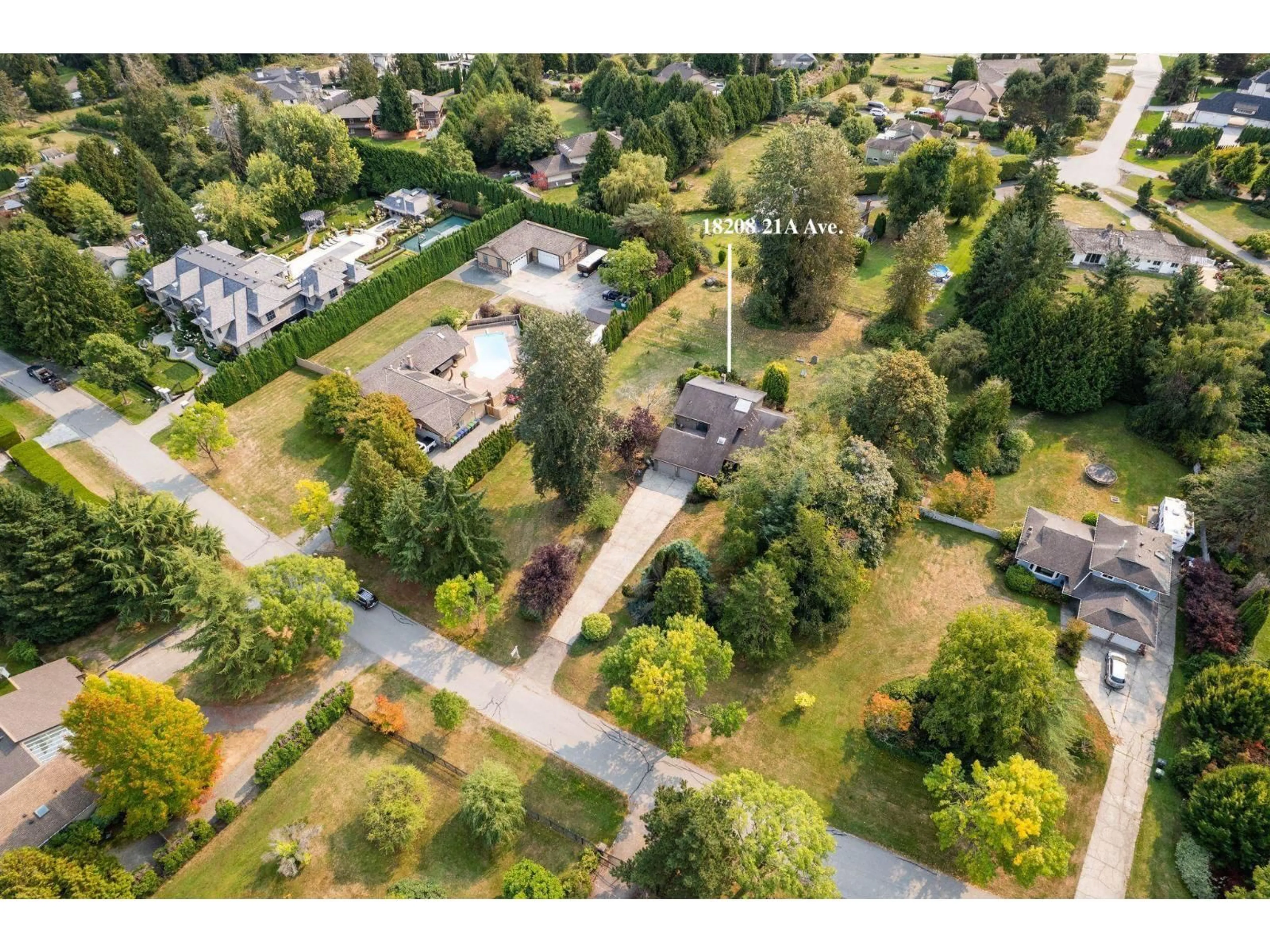 A pic from outside/outdoor area/front of a property/back of a property/a pic from drone, street for 18208 21A AVENUE, Surrey British Columbia V3Z9W2