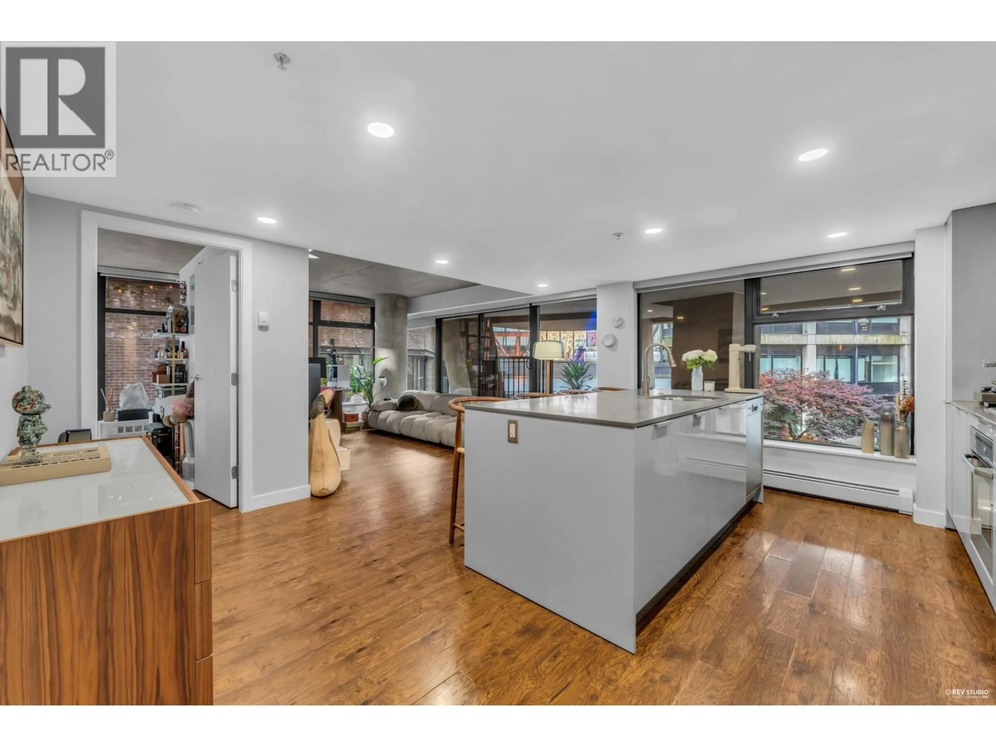 Open concept kitchen, wood/laminate floor for 605 - 128 CORDOVA STREET, Vancouver British Columbia V6B0E6