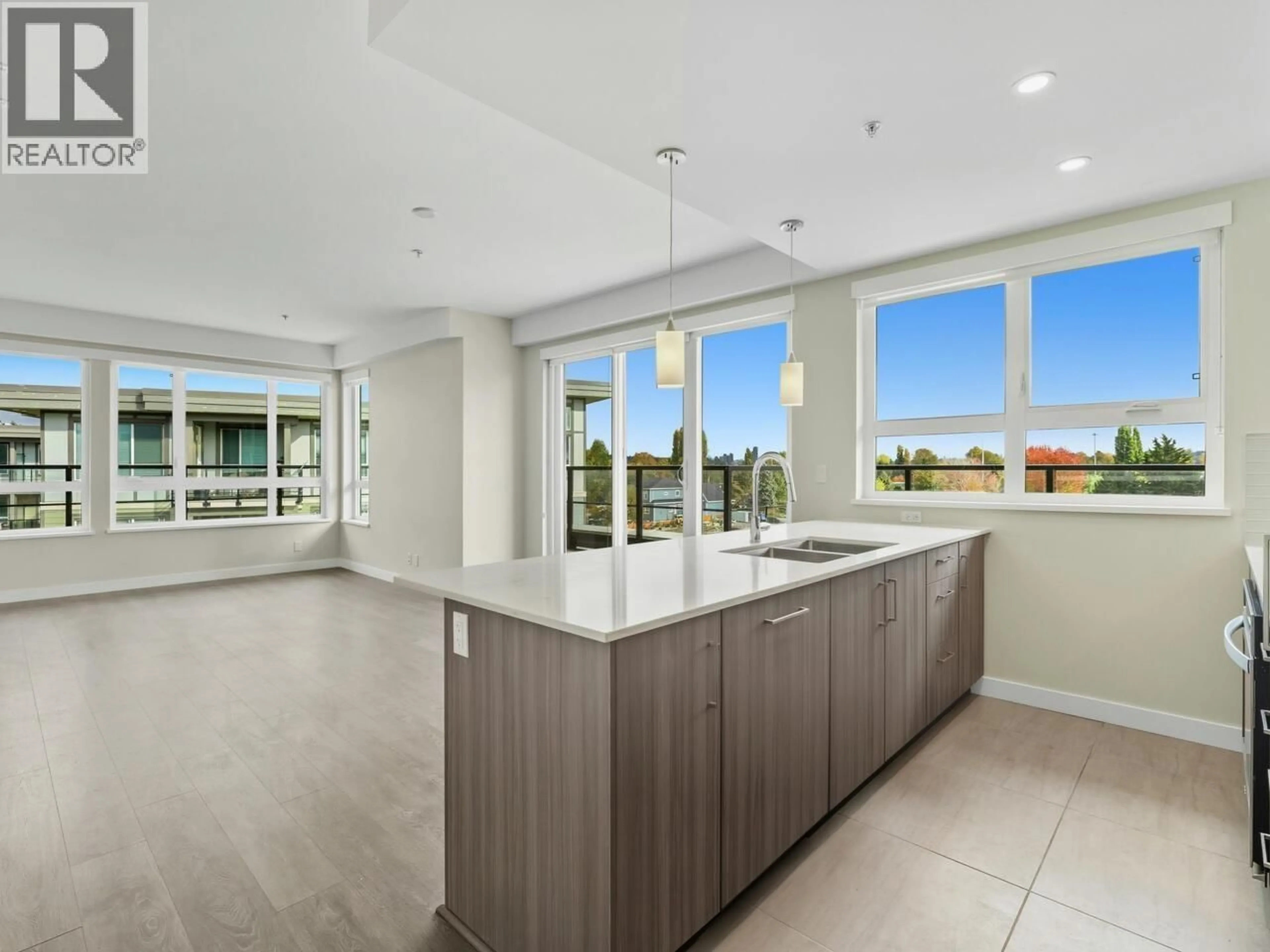 Open concept kitchen, ceramic/tile floor for 401 - 23233 GILLEY ROAD, Richmond British Columbia V6V1E6