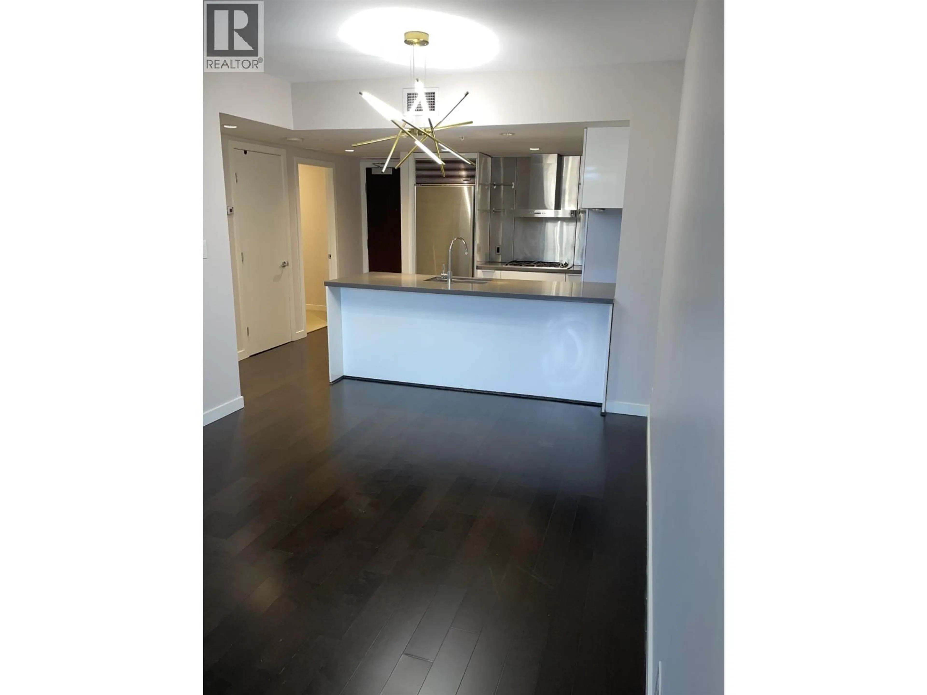 Open concept kitchen, wood/laminate floor for 1507 - 788 RICHARDS STREET, Vancouver British Columbia V6B0C7