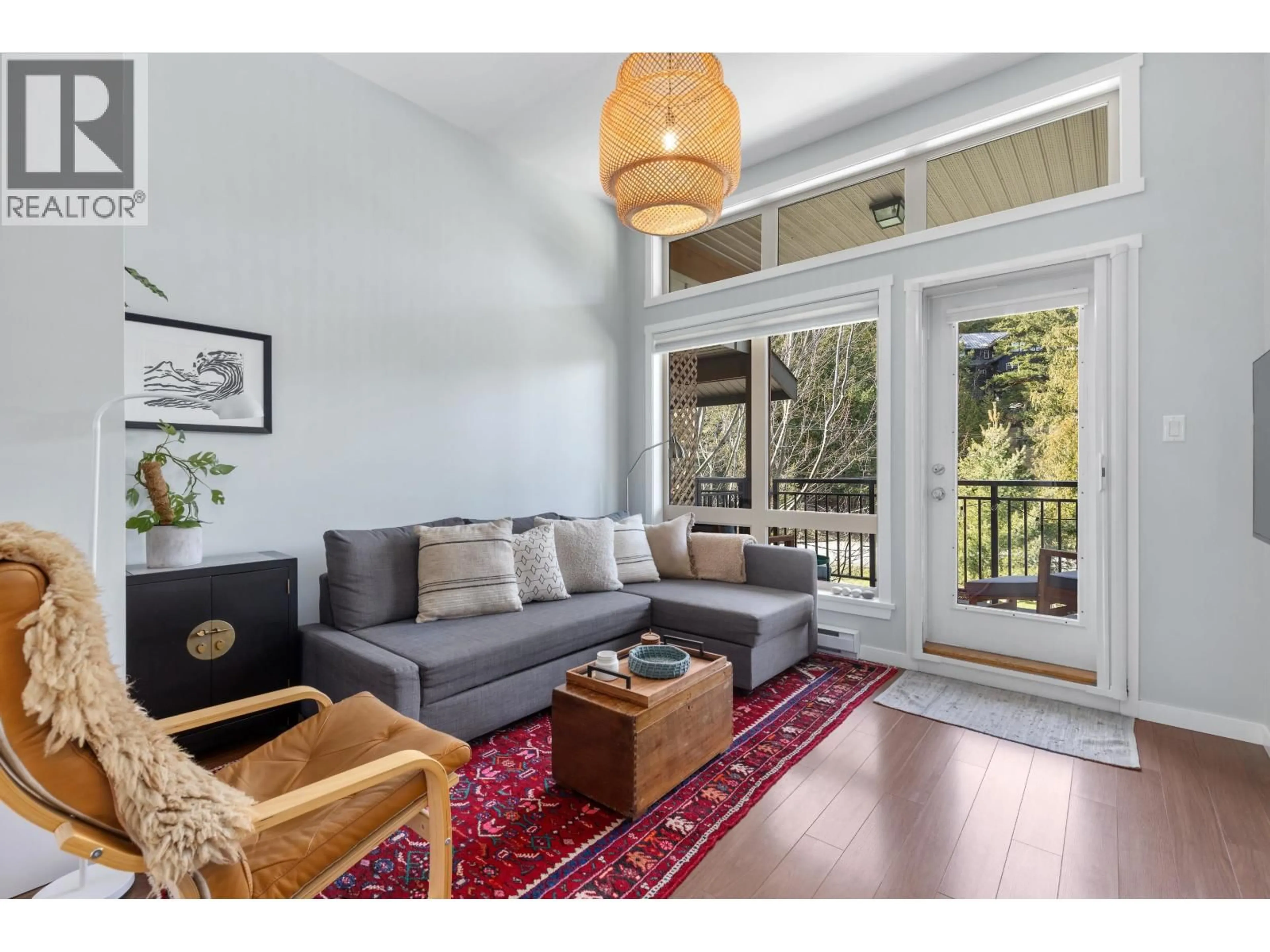 Living room with furniture, wood/laminate floor for 6 - 7450 PROSPECT STREET, Pemberton British Columbia V0N2L1