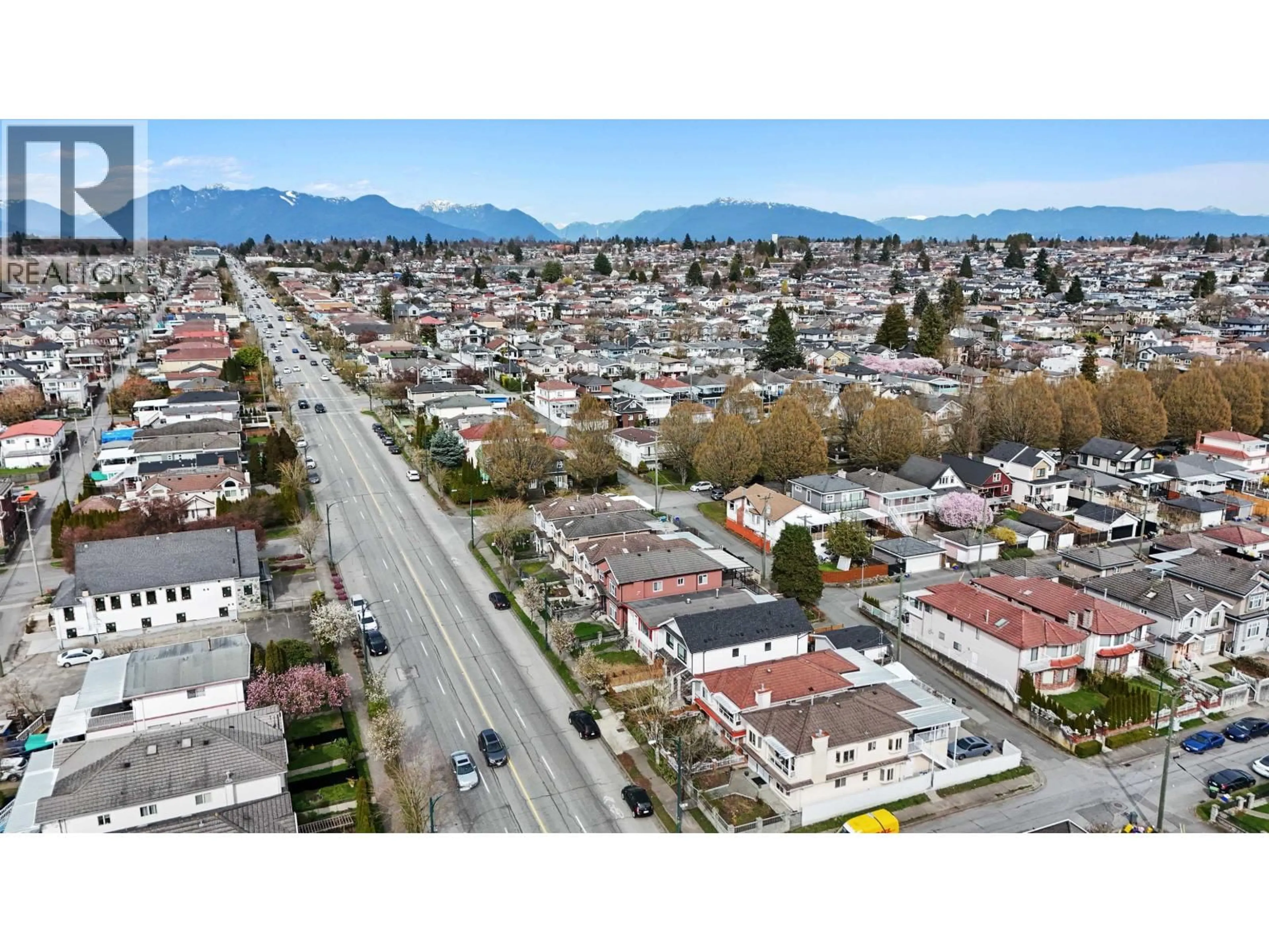 A pic from outside/outdoor area/front of a property/back of a property/a pic from drone, mountain view for 7656 MAIN STREET, Vancouver British Columbia V5X3K3