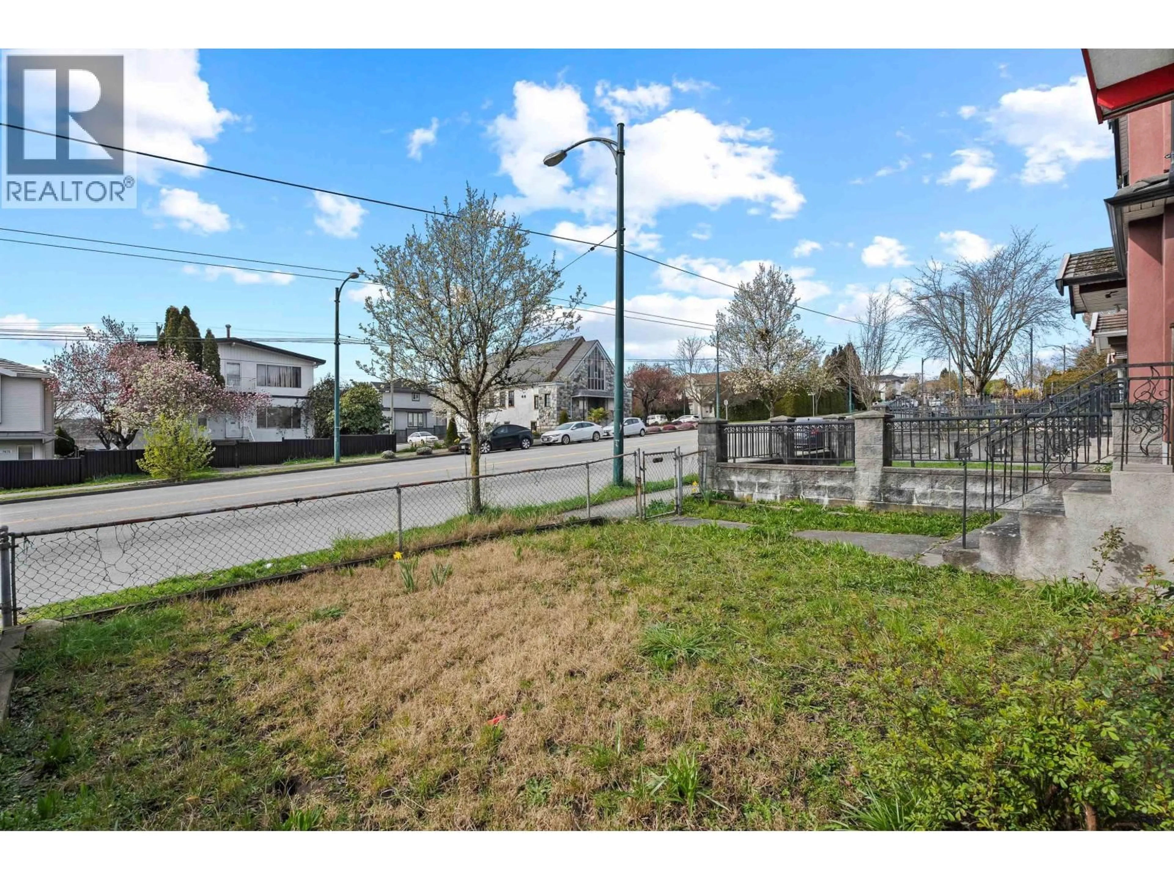 A pic from outside/outdoor area/front of a property/back of a property/a pic from drone, street for 7656 MAIN STREET, Vancouver British Columbia V5X3K3