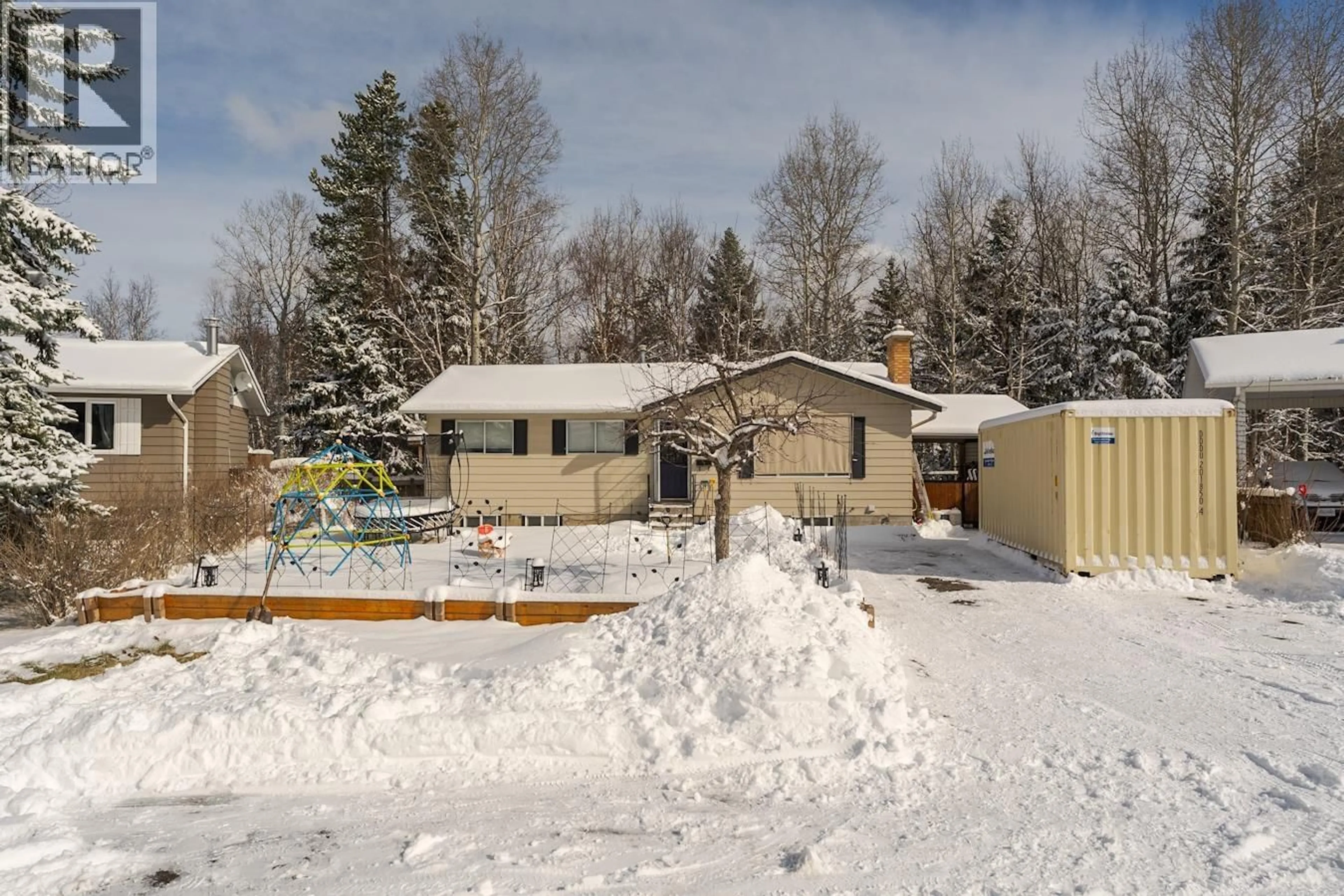 A pic from outside/outdoor area/front of a property/back of a property/a pic from drone, street for 7104 HARTFORD CRESCENT, Prince George British Columbia V2N0A8