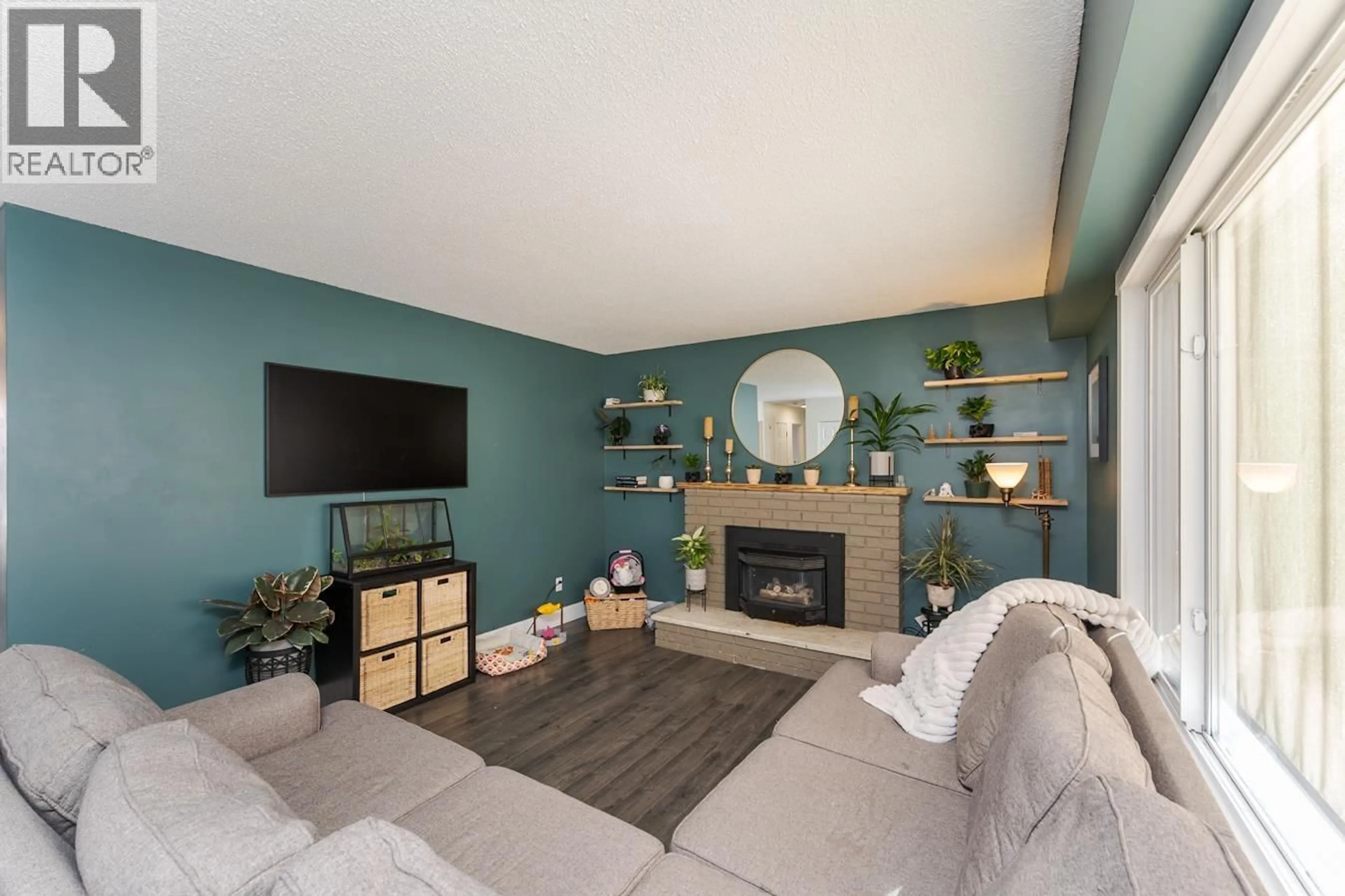 Living room with furniture, unknown for 7104 HARTFORD CRESCENT, Prince George British Columbia V2N0A8