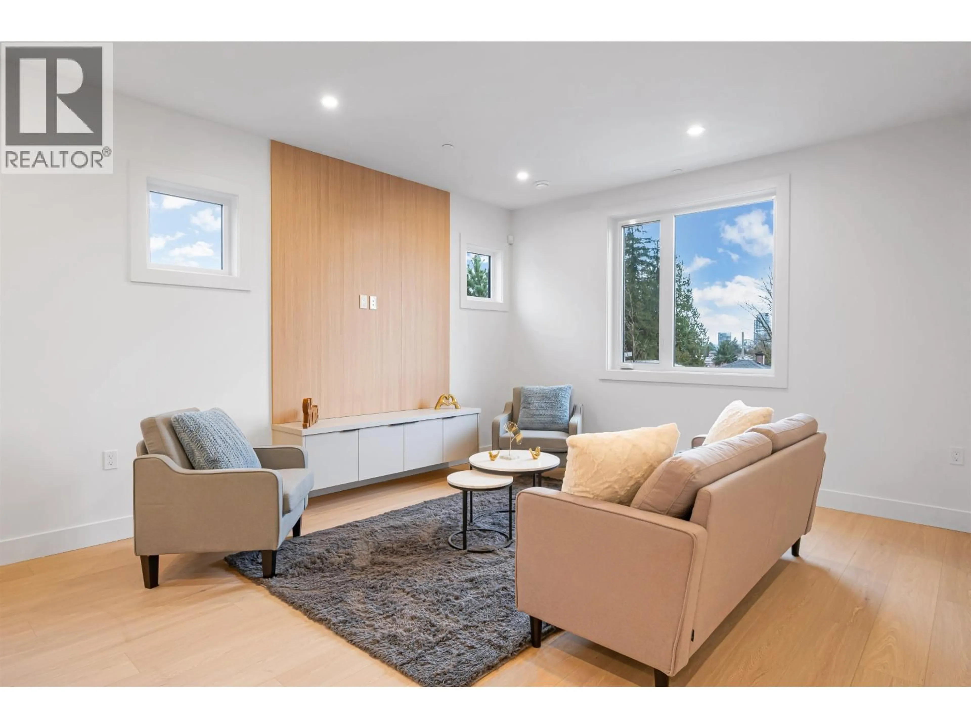 Living room with furniture, wood/laminate floor for 3 - 4855 VENABLES STREET, Burnaby British Columbia V5C3A9