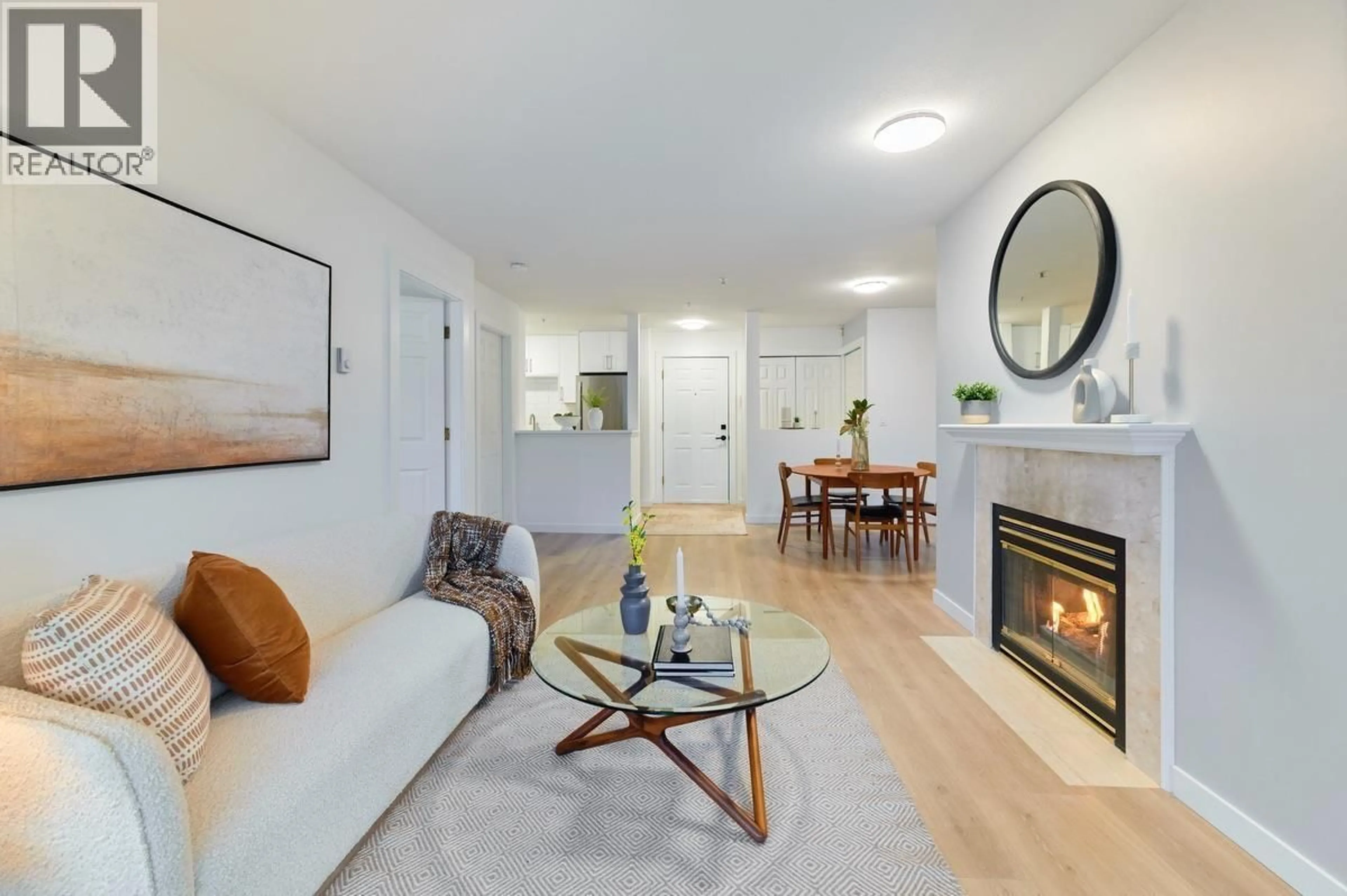 Living room with furniture, wood/laminate floor for 313 - 855 16TH STREET, North Vancouver British Columbia V7P1R2