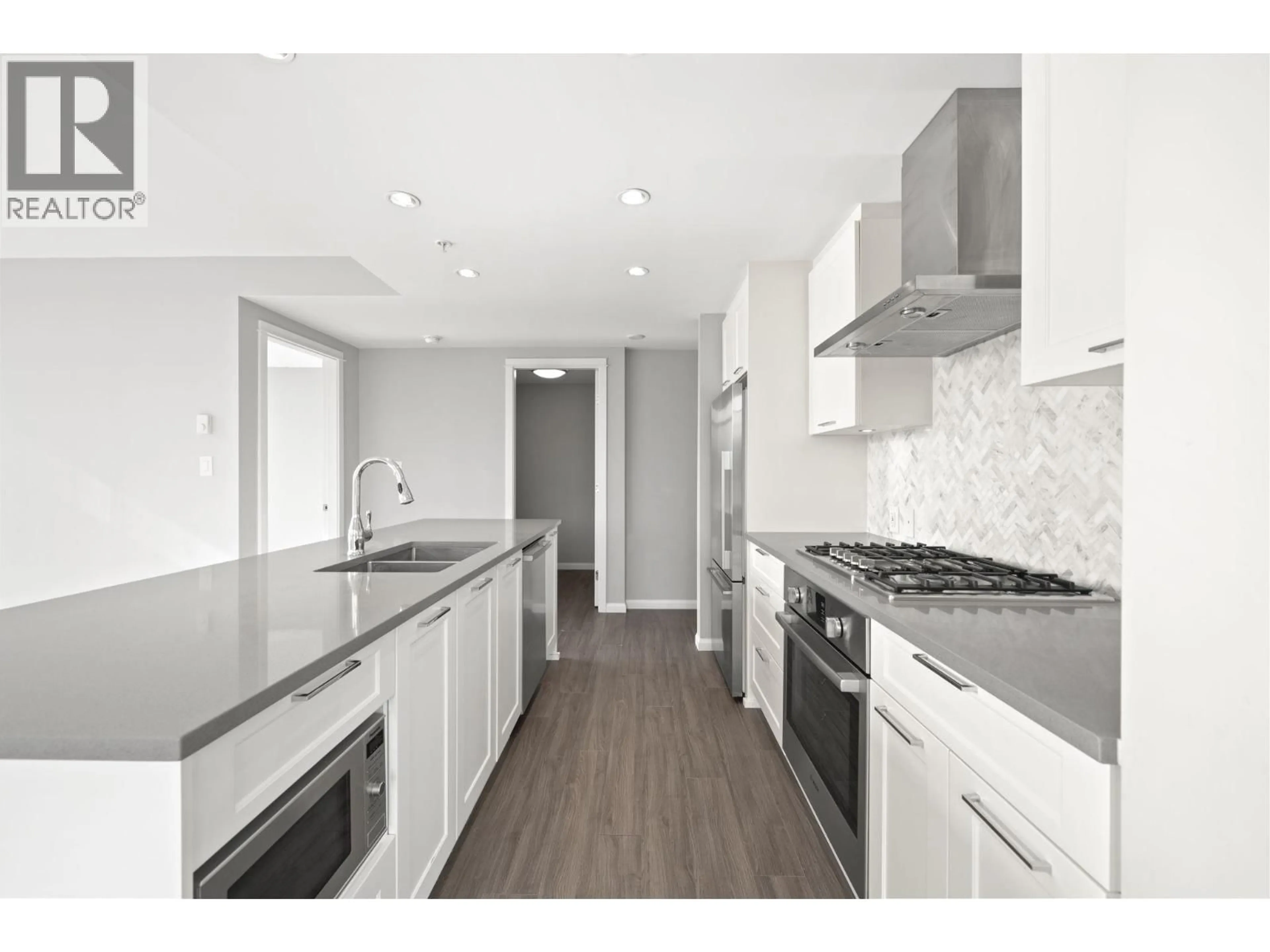 Open concept kitchen, unknown for 807 - 520 COMO LAKE AVENUE, Coquitlam British Columbia V3J0E8