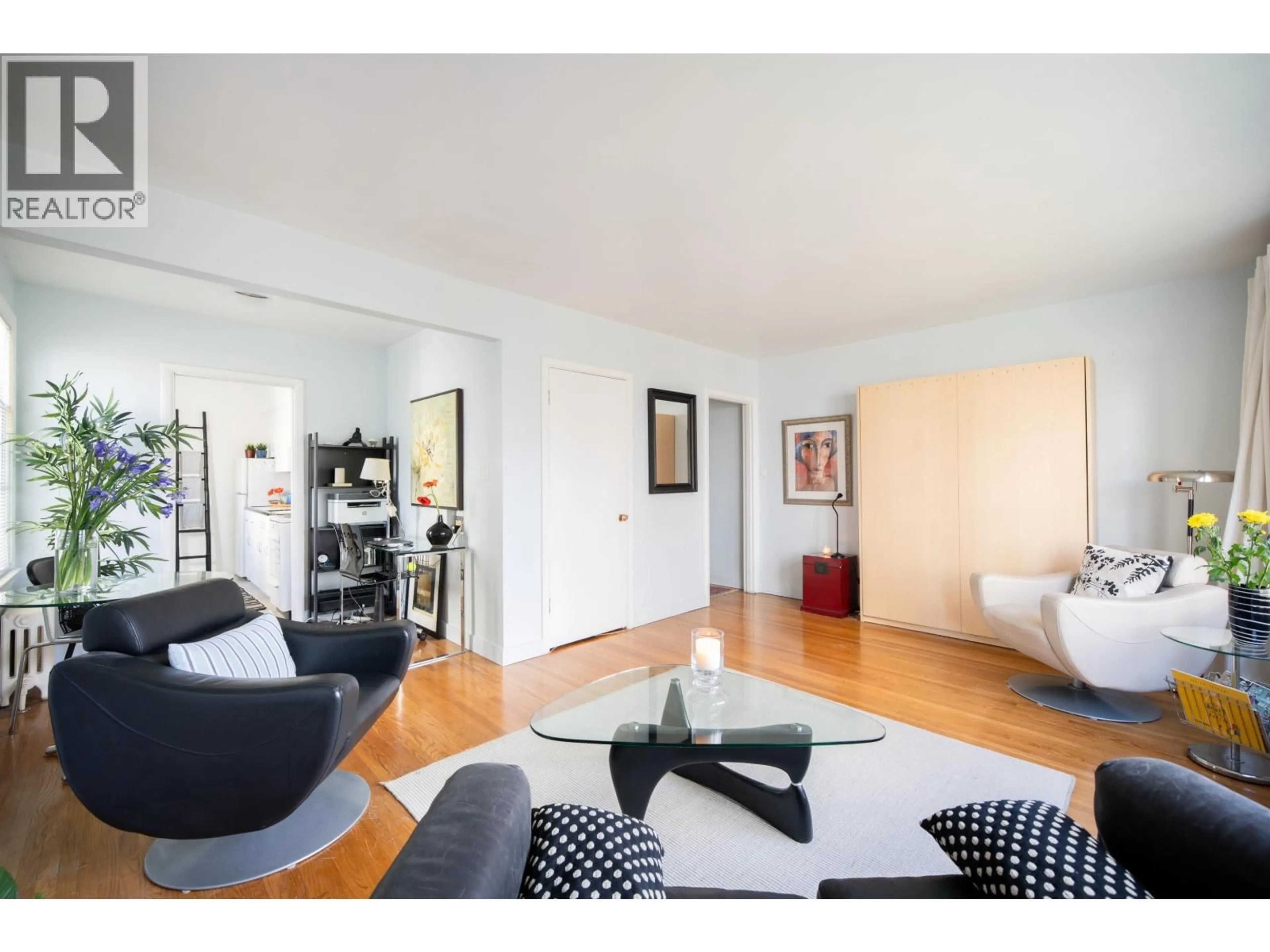 Living room with furniture, wood/laminate floor for 303 - 1565 BURNABY STREET, Vancouver British Columbia V6G1X1