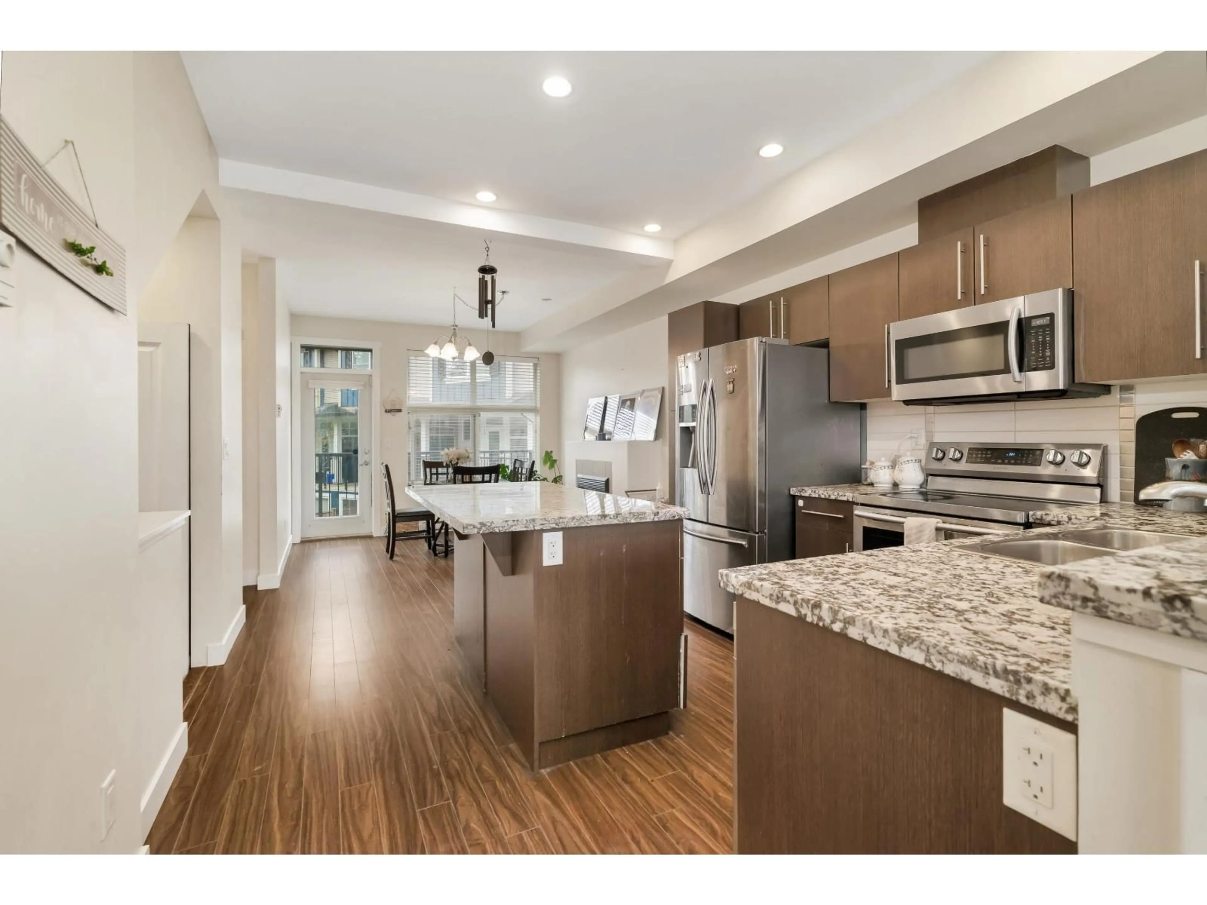 Open concept kitchen, unknown for 7 - 18211 70 AVENUE, Surrey British Columbia V3S8K9