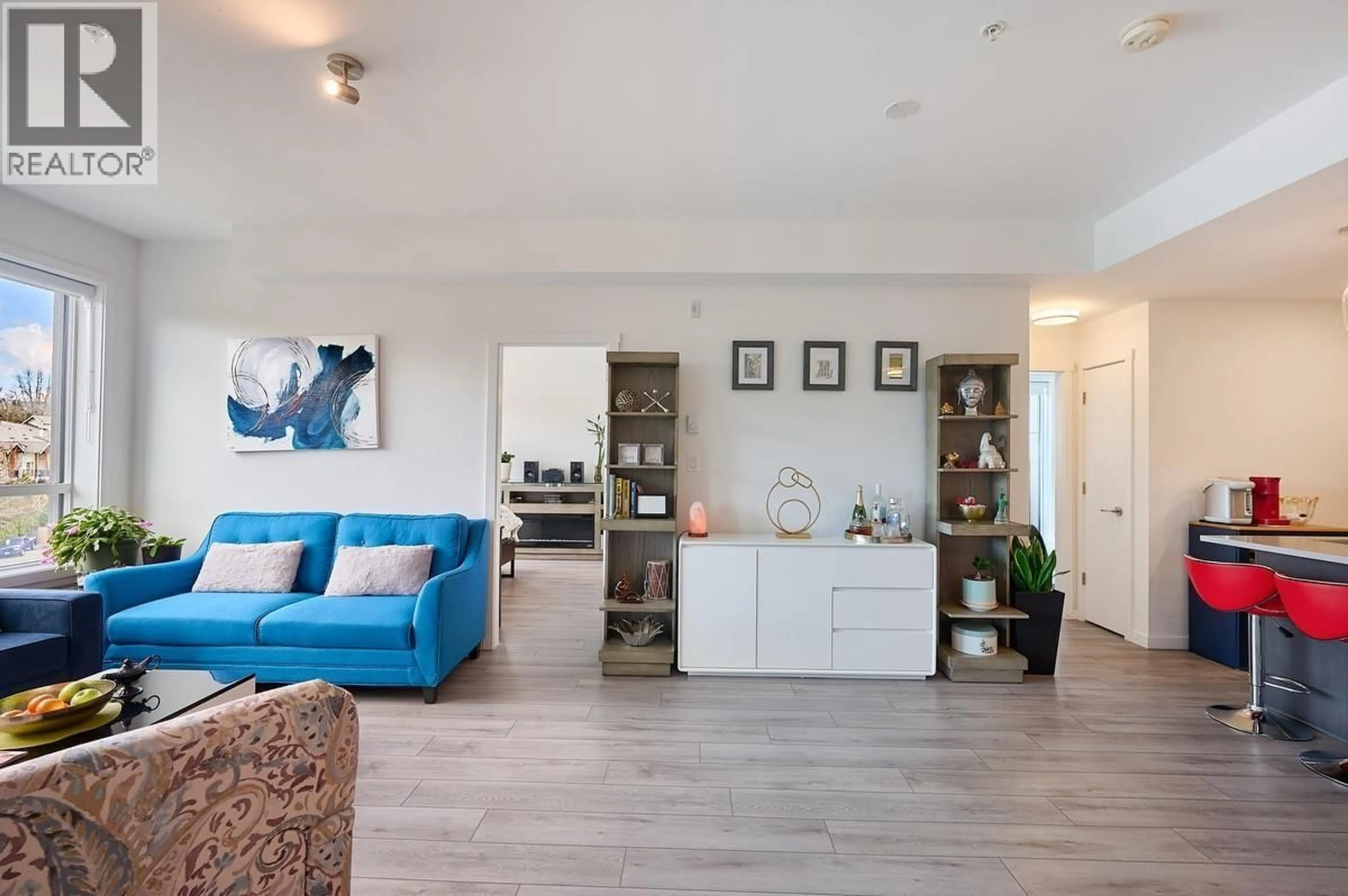 Living room with furniture, wood/laminate floor for 317 - 11641 227 STREET, Maple Ridge British Columbia V2X9J6