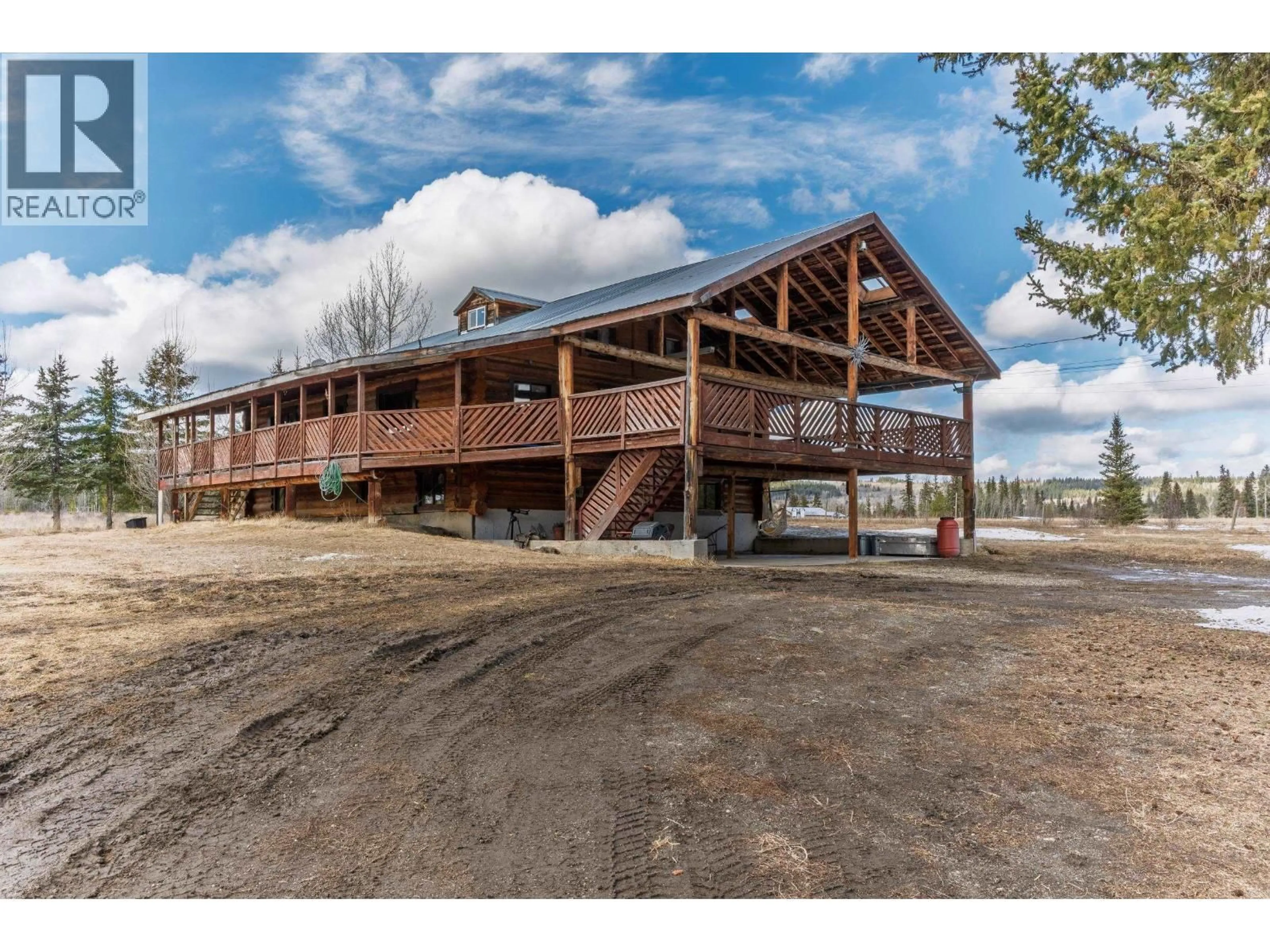 A pic from outside/outdoor area/front of a property/back of a property/a pic from drone, building for 2293 DOYLE ROAD, 150 Mile House British Columbia V0K2G0