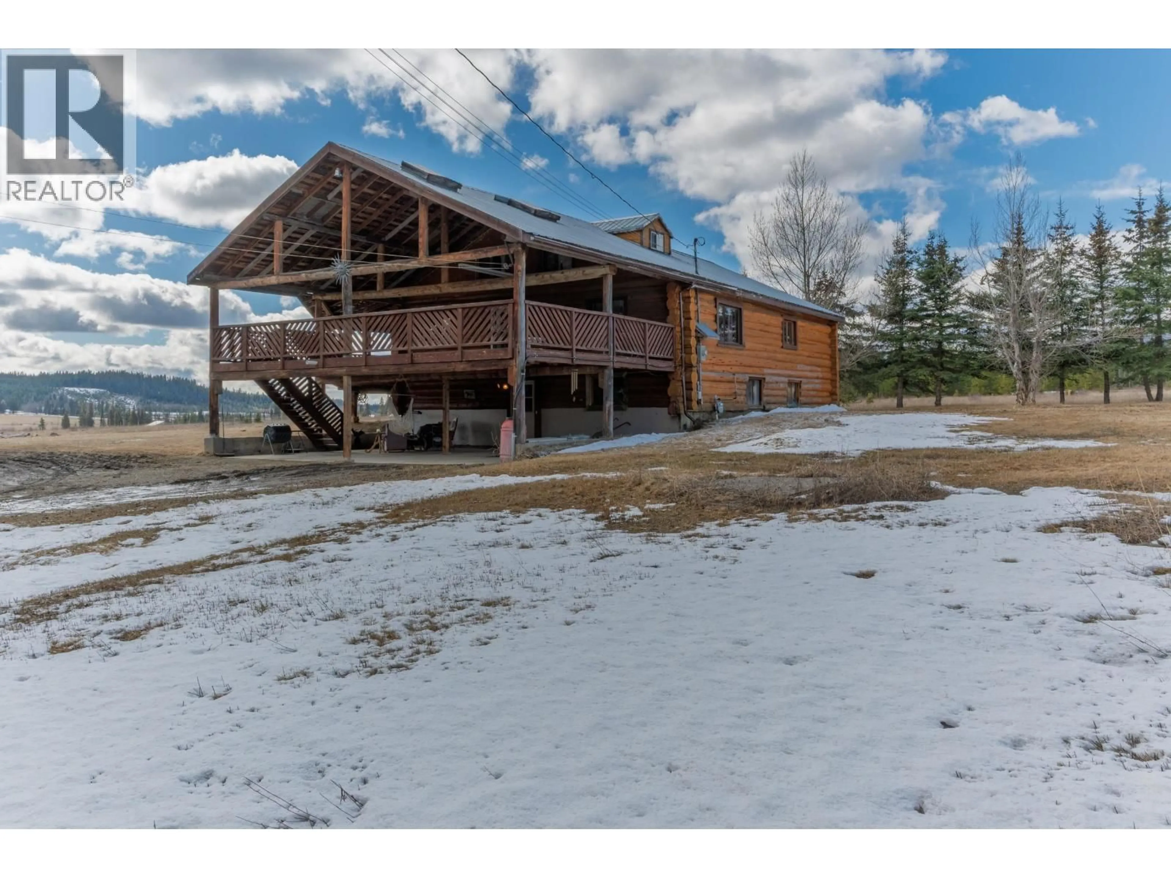 A pic from outside/outdoor area/front of a property/back of a property/a pic from drone, unknown for 2293 DOYLE ROAD, 150 Mile House British Columbia V0K2G0