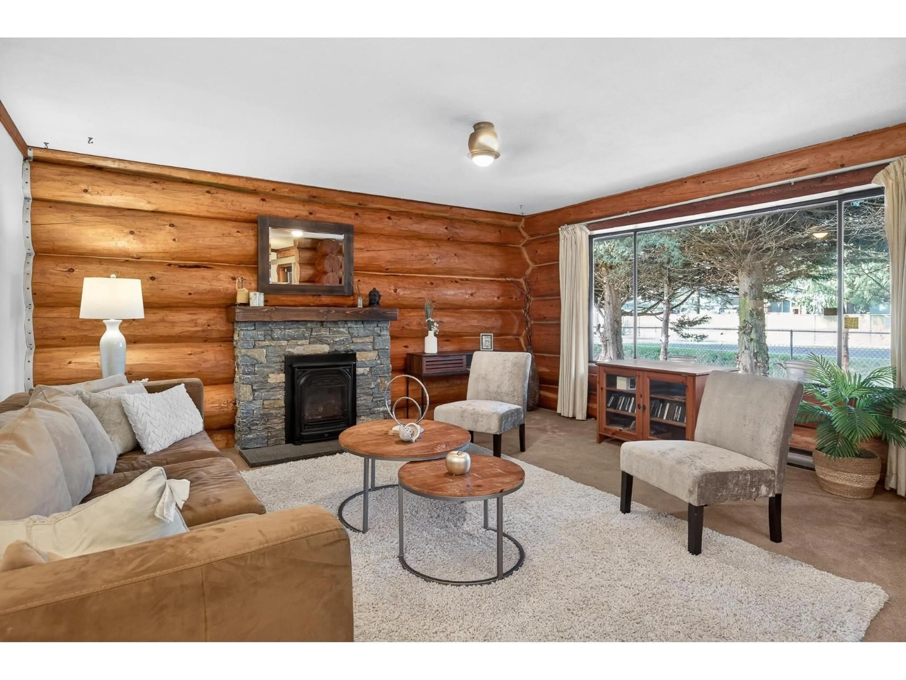 Living room with furniture, wood/laminate floor for 27210 26B AVENUE, Langley British Columbia V4W3K2