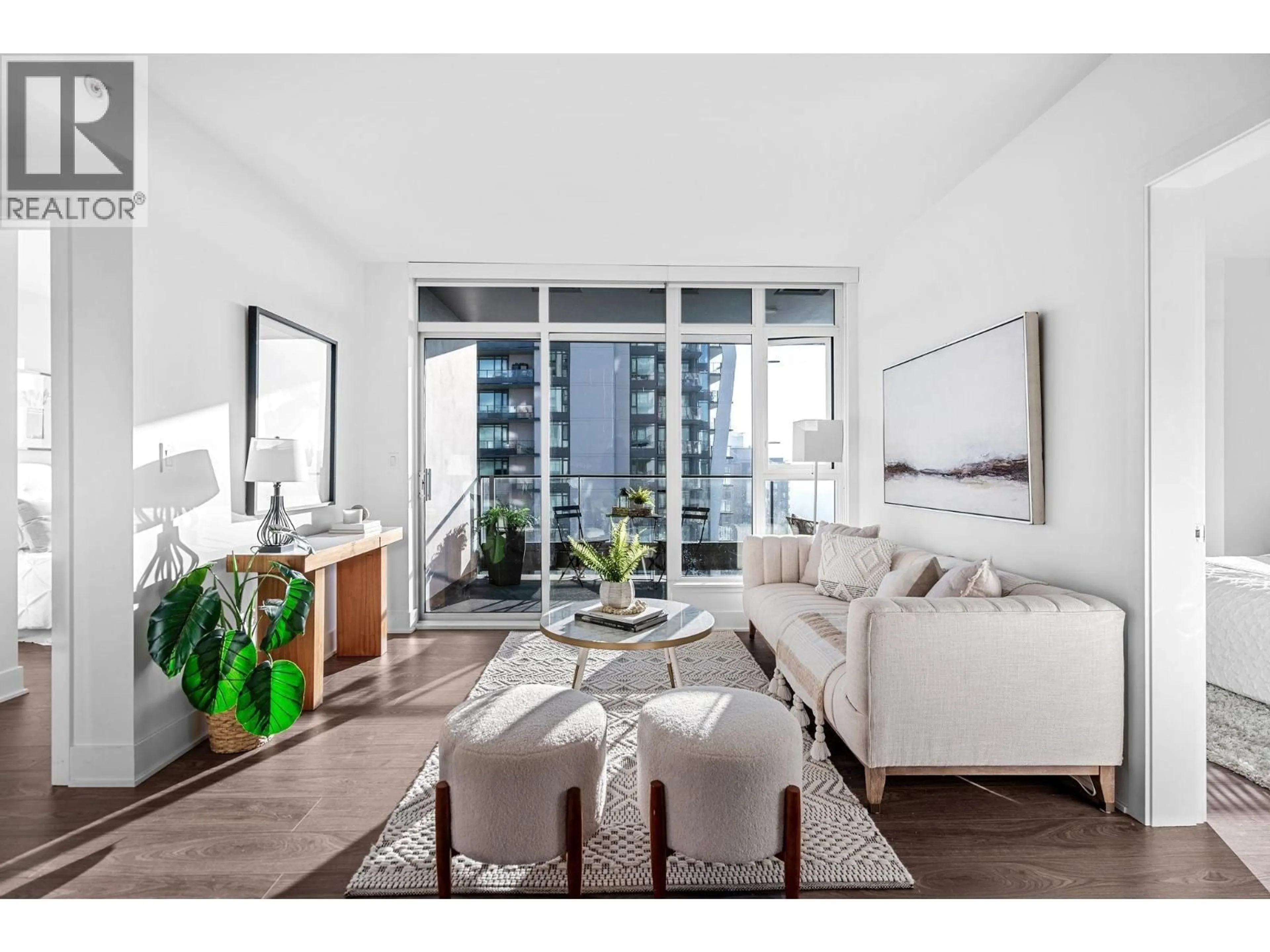 Living room with furniture, wood/laminate floor for 1207 - 450 WESTVIEW STREET, Coquitlam British Columbia V3K6C3