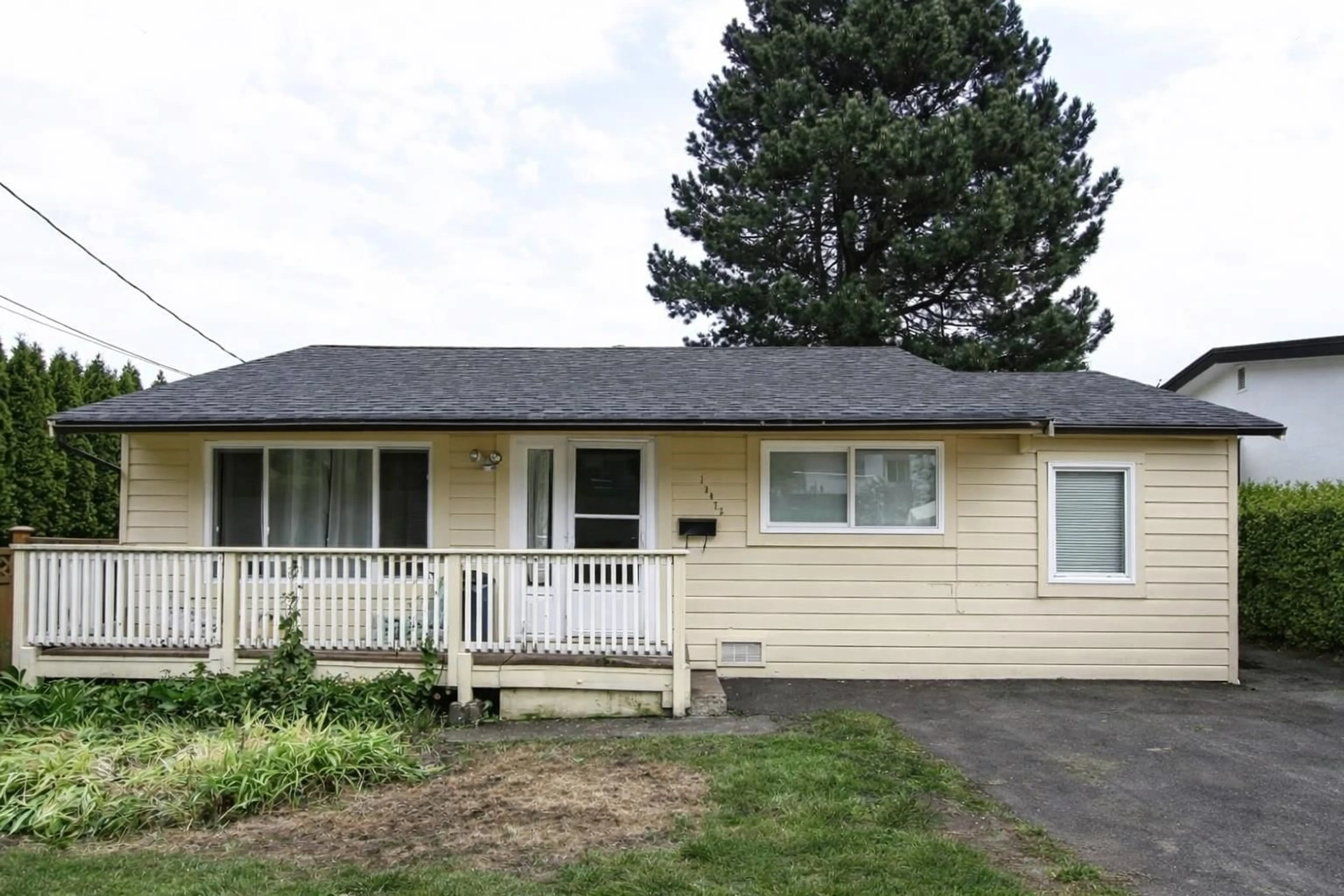 Home with vinyl exterior material, street for 13475 HILTON ROAD, Surrey British Columbia V3R5J3