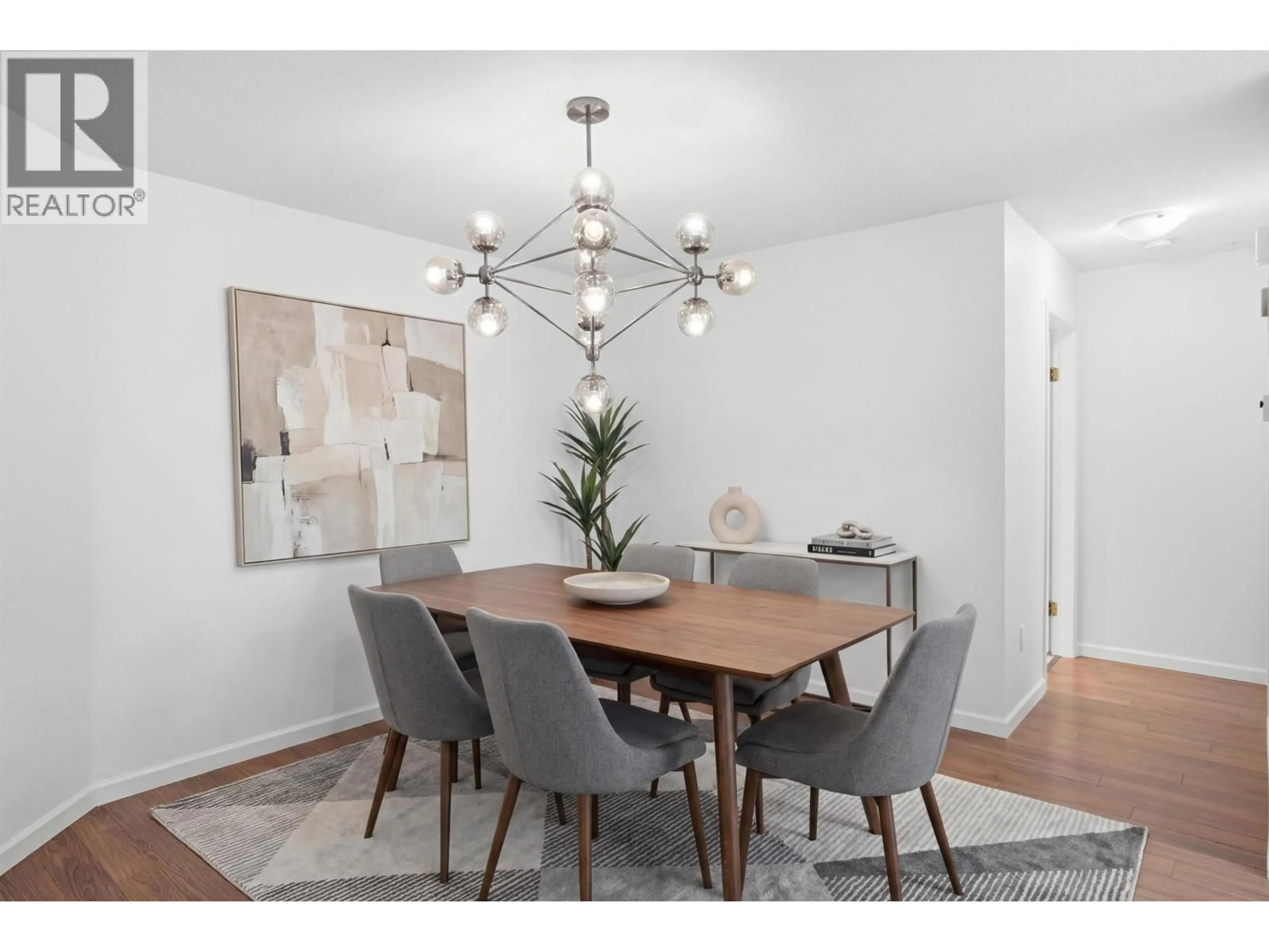 Dining room, wood/laminate floor for 106 - 3670 BANFF COURT, North Vancouver British Columbia V7H2Y7