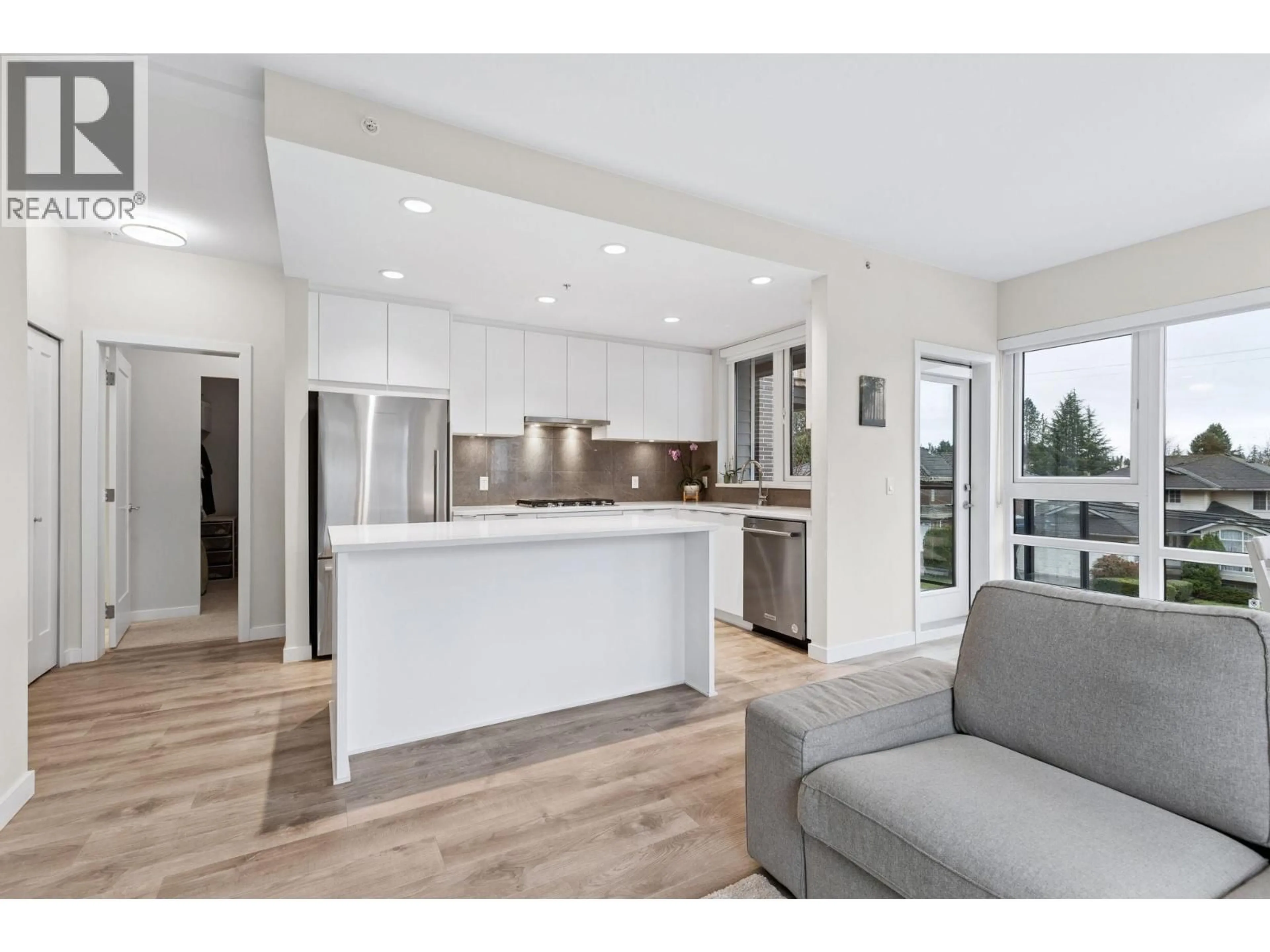 Open concept kitchen, wood/laminate floor for 315 - 615 COTTONWOOD AVENUE, Coquitlam British Columbia V3J2S5