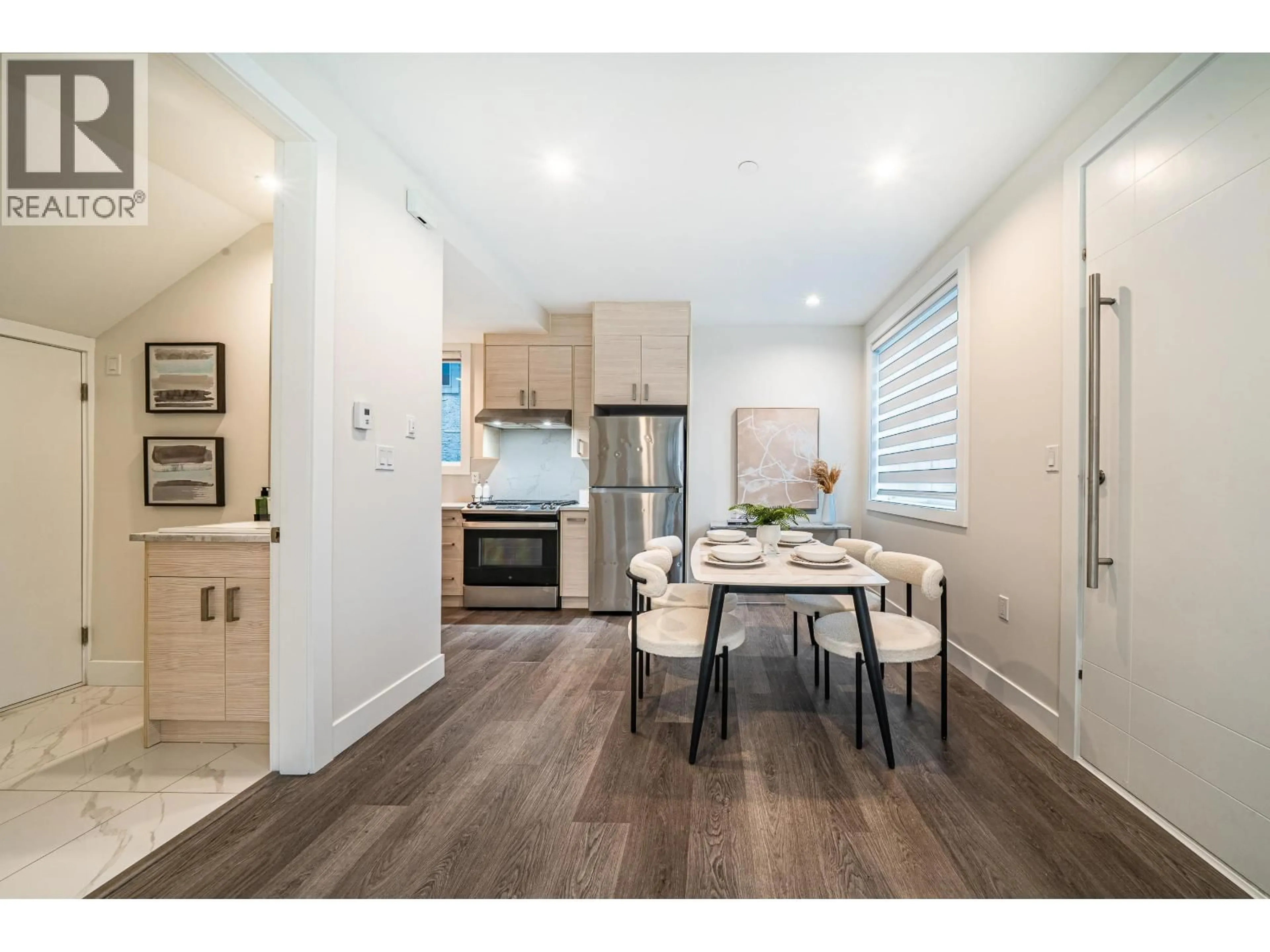 Open concept kitchen, wood/laminate floor for 7261 SHERBROOKE STREET, Vancouver British Columbia V5X1T7