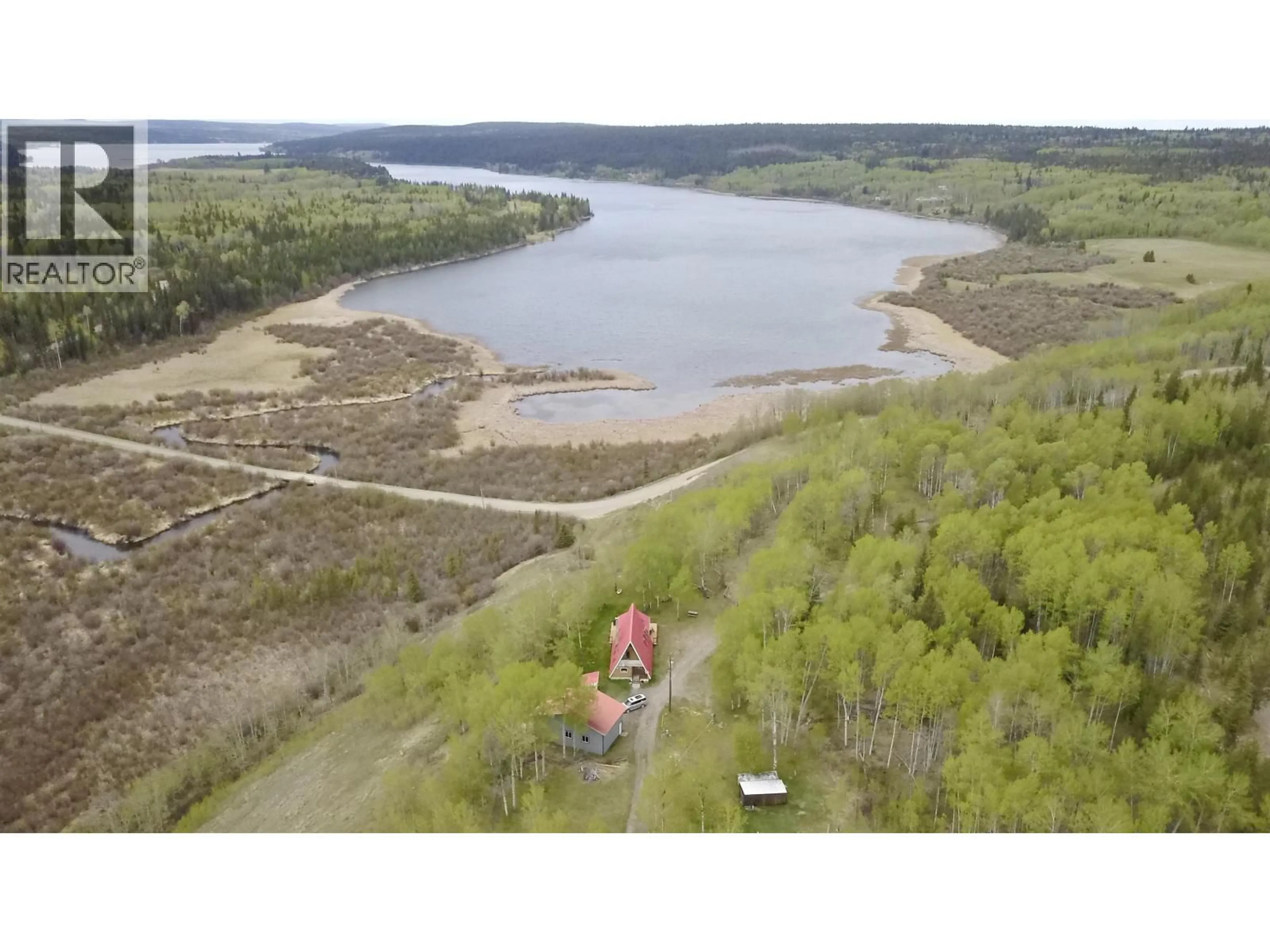 A pic from outside/outdoor area/front of a property/back of a property/a pic from drone, water/lake/river/ocean view for 6405 DOMAN ROAD, Horse Lake British Columbia V0K1X3