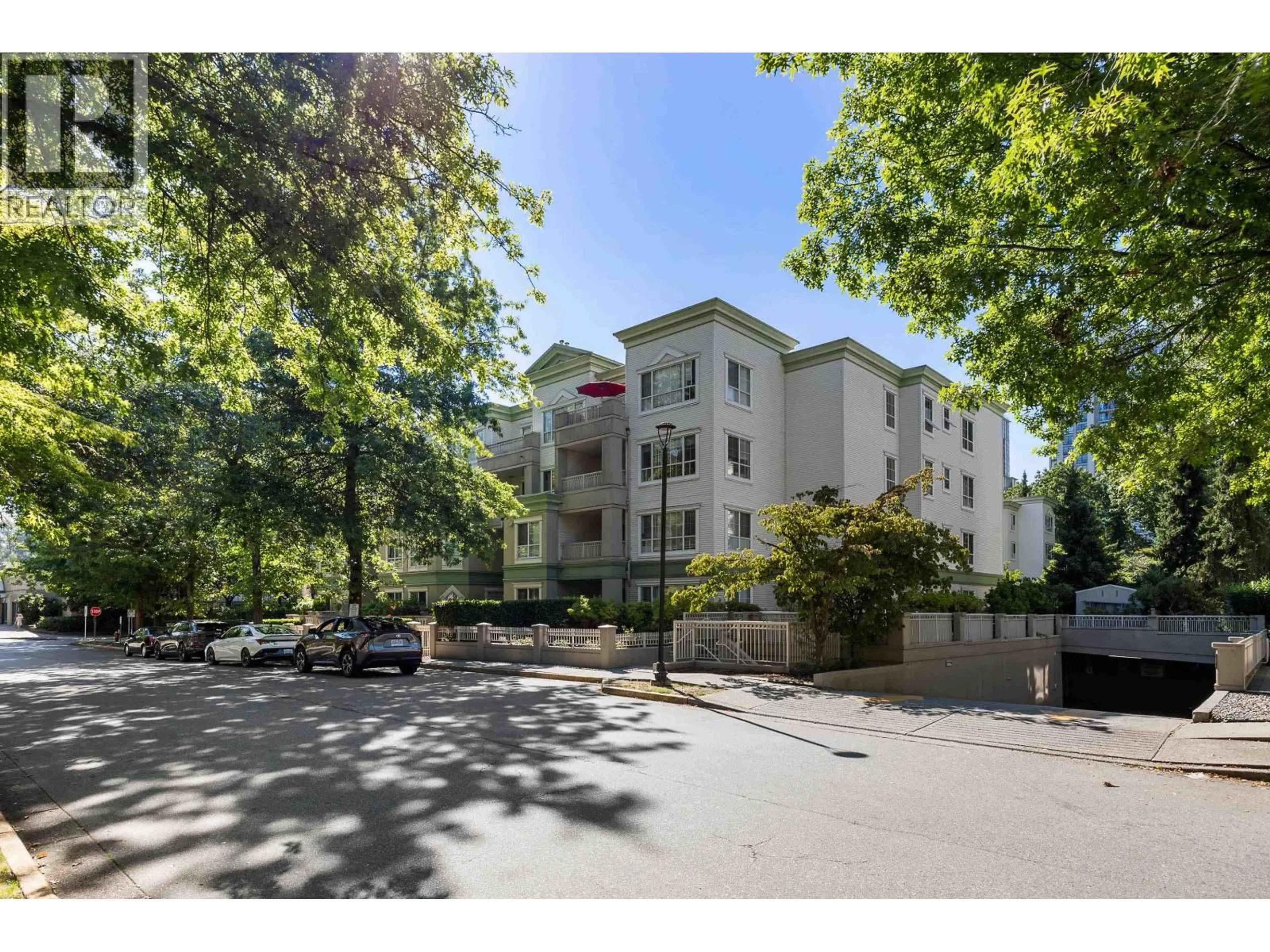 A pic from outside/outdoor area/front of a property/back of a property/a pic from drone, unknown for 206 - 2990 PRINCESS CRESCENT, Coquitlam British Columbia V3B7R3