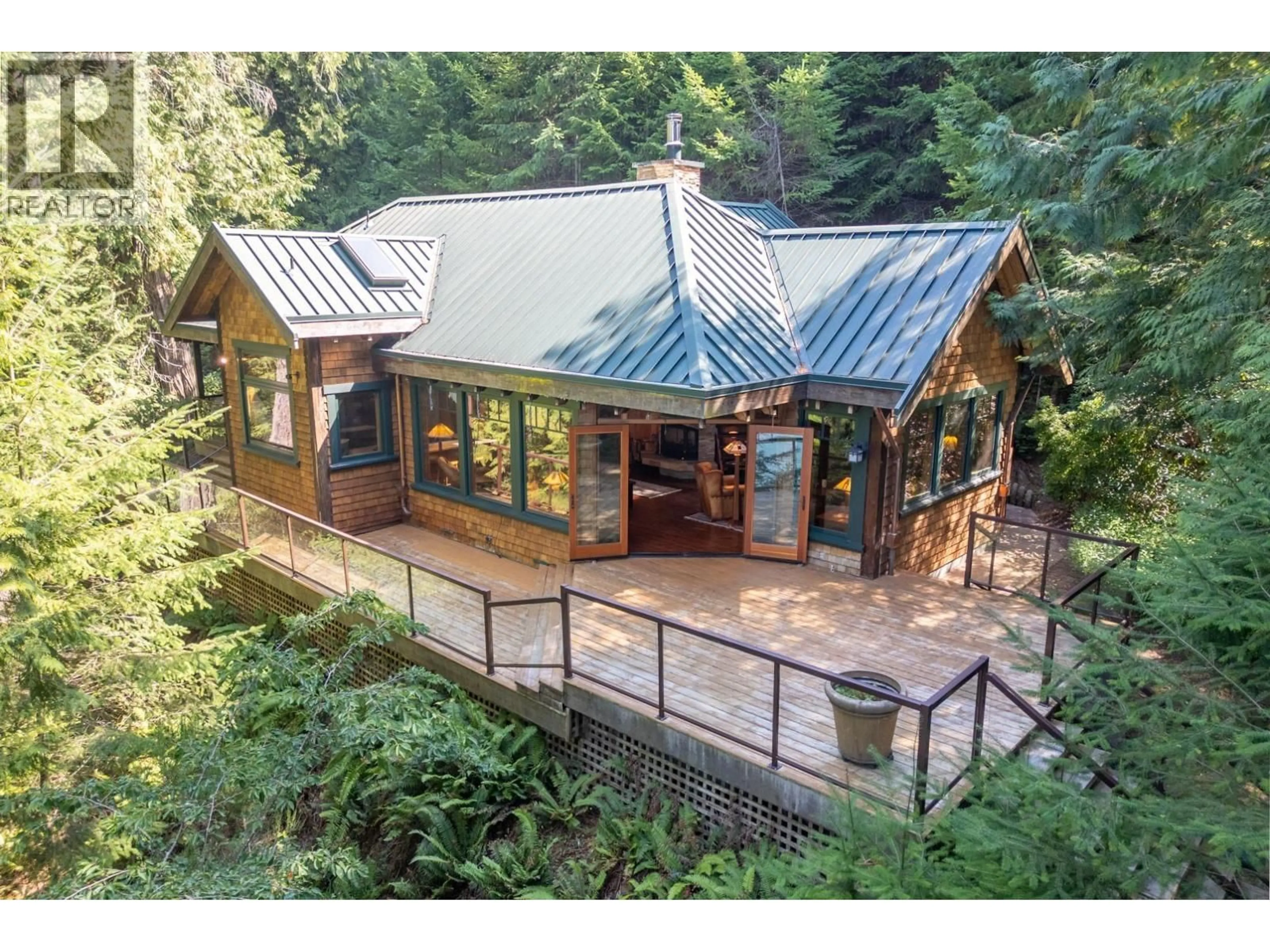A pic from outside/outdoor area/front of a property/back of a property/a pic from drone, unknown for 8807 AINSLIE POINT ROAD, Pender Island British Columbia V0N2M3