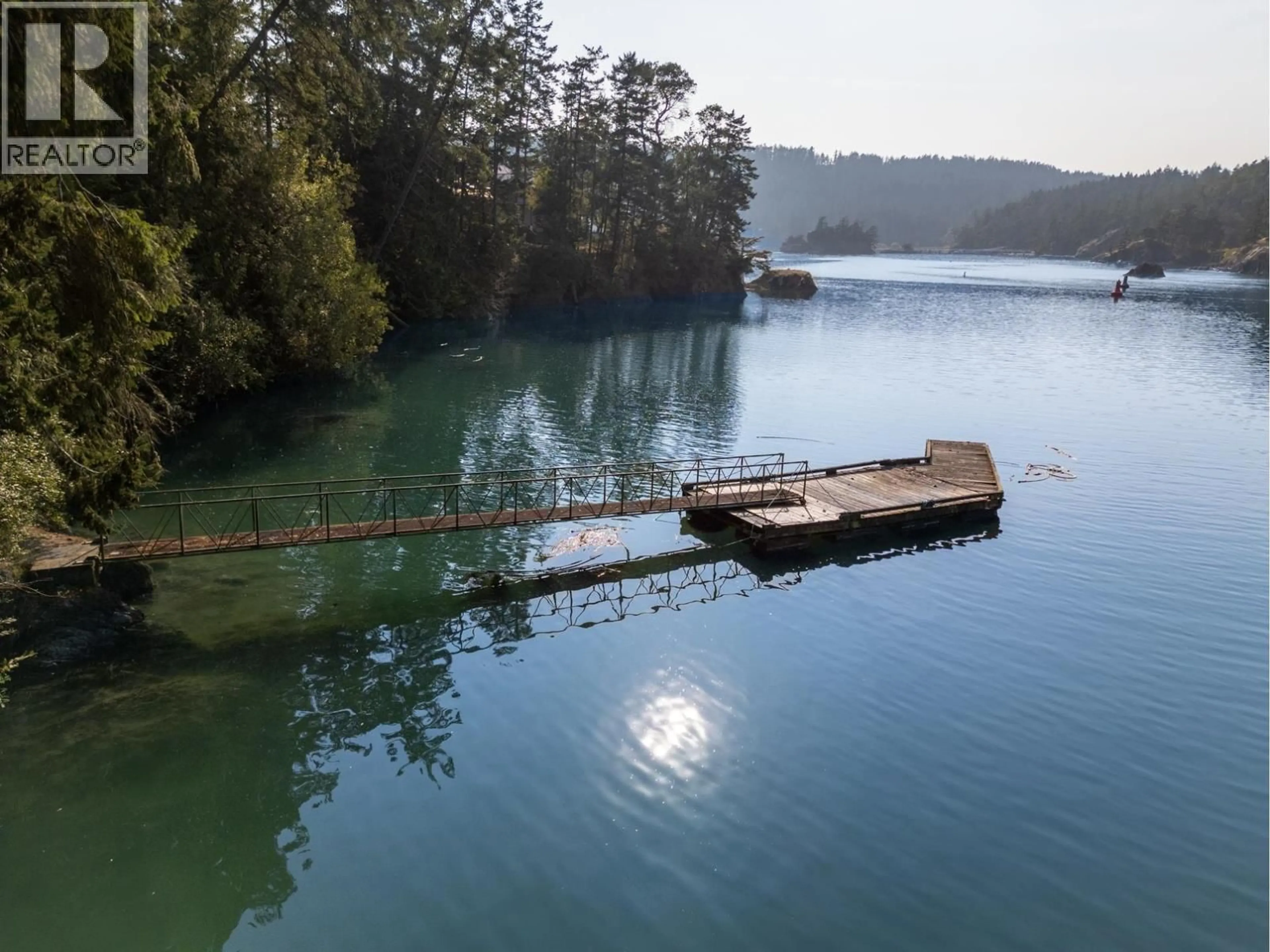 A pic from outside/outdoor area/front of a property/back of a property/a pic from drone, water/lake/river/ocean view for 8807 AINSLIE POINT ROAD, Pender Island British Columbia V0N2M3
