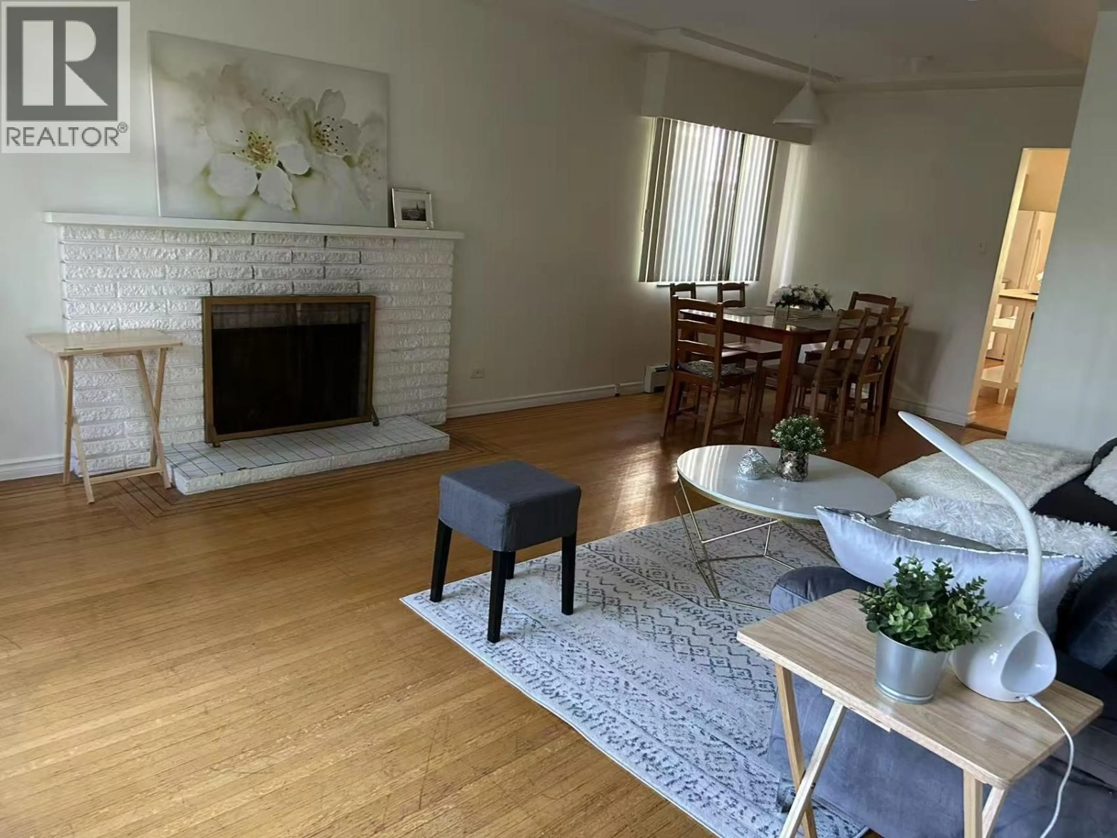 Living room with furniture, wood/laminate floor for 3514 8TH AVENUE, Vancouver British Columbia V6R1Y7