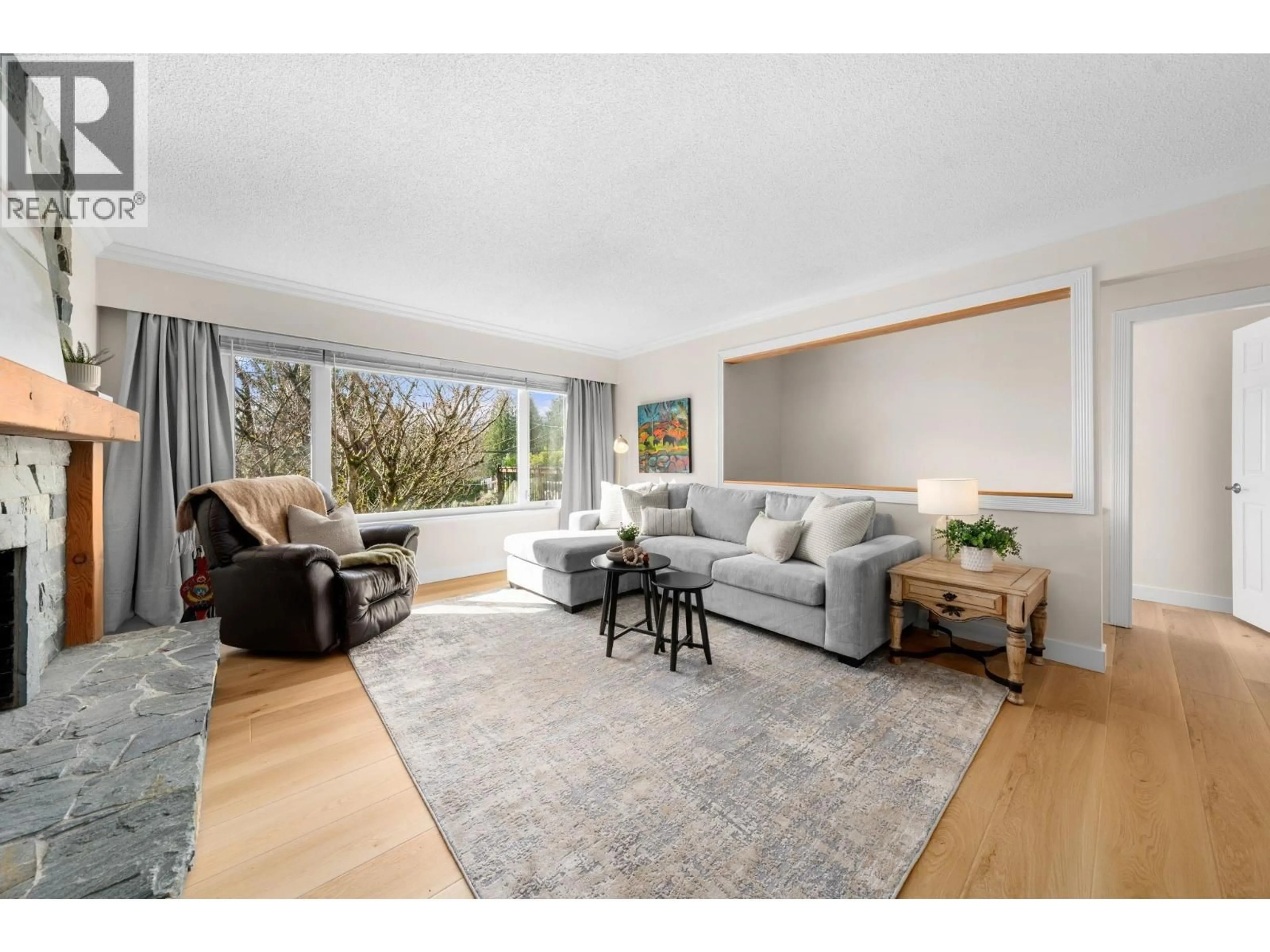 Living room with furniture, wood/laminate floor for 3300 MAHON AVENUE, North Vancouver British Columbia V7N3T5